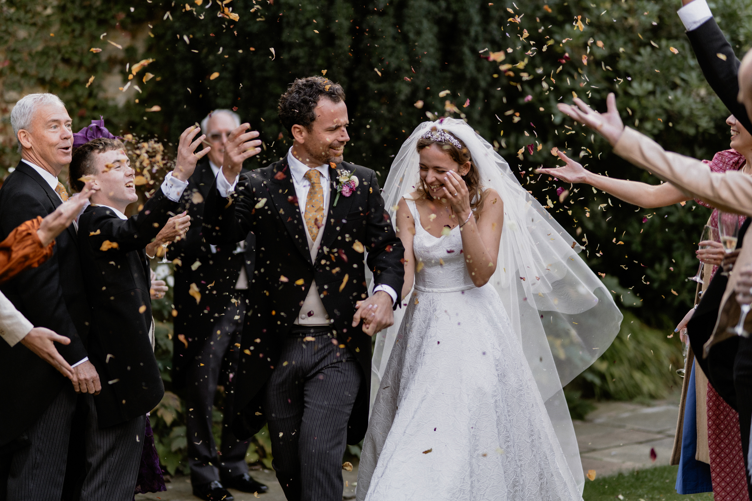 Oxford University Wedding James Kimberley Photography 96 - An Elegant Oxford Oratory Wedding Planned in Just Five Months Bride and groom showered in confetti for the Oxford University wedding