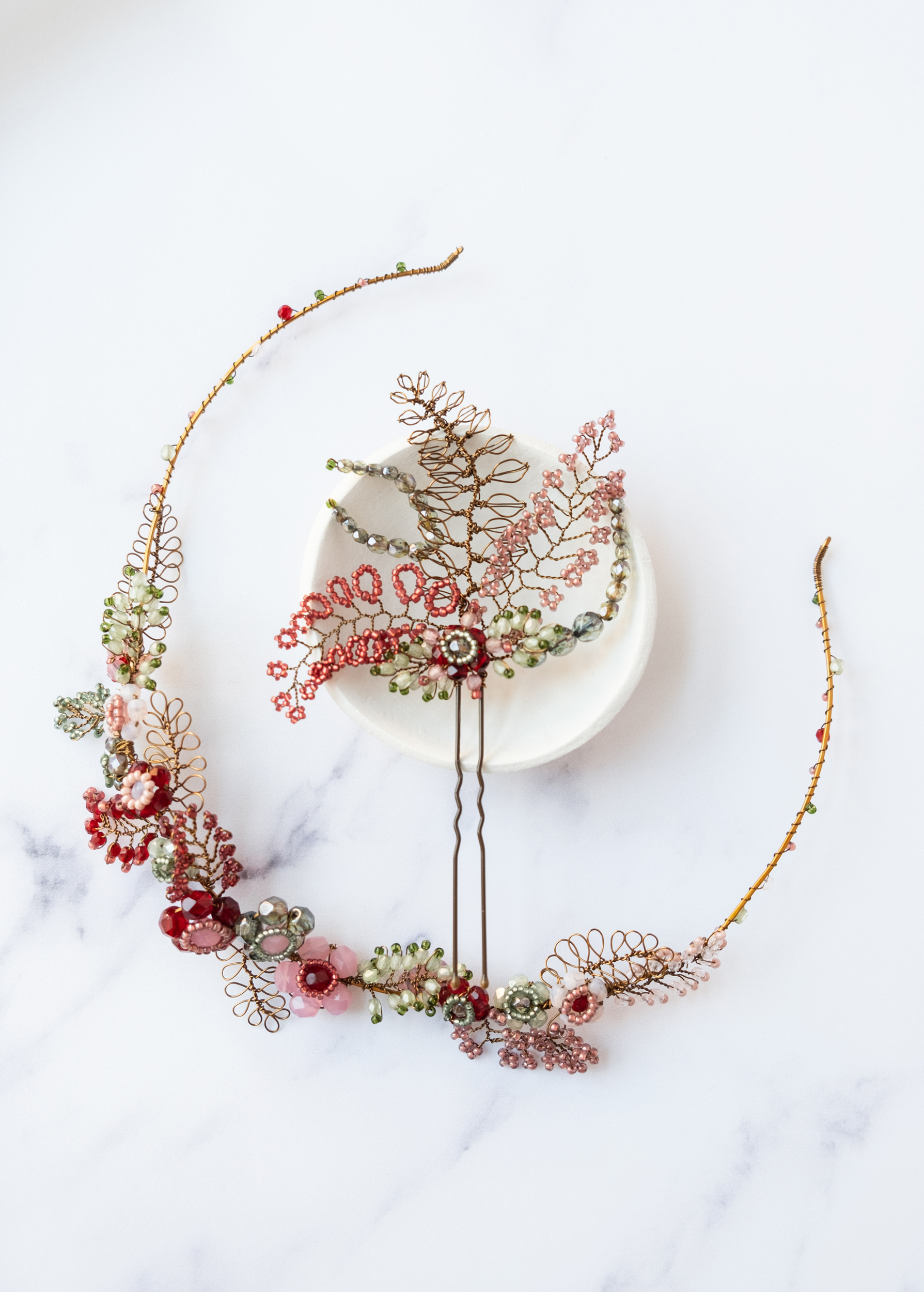 Delicate and elegant berry colour handmade bridal crown by Judith Brown Bridal.