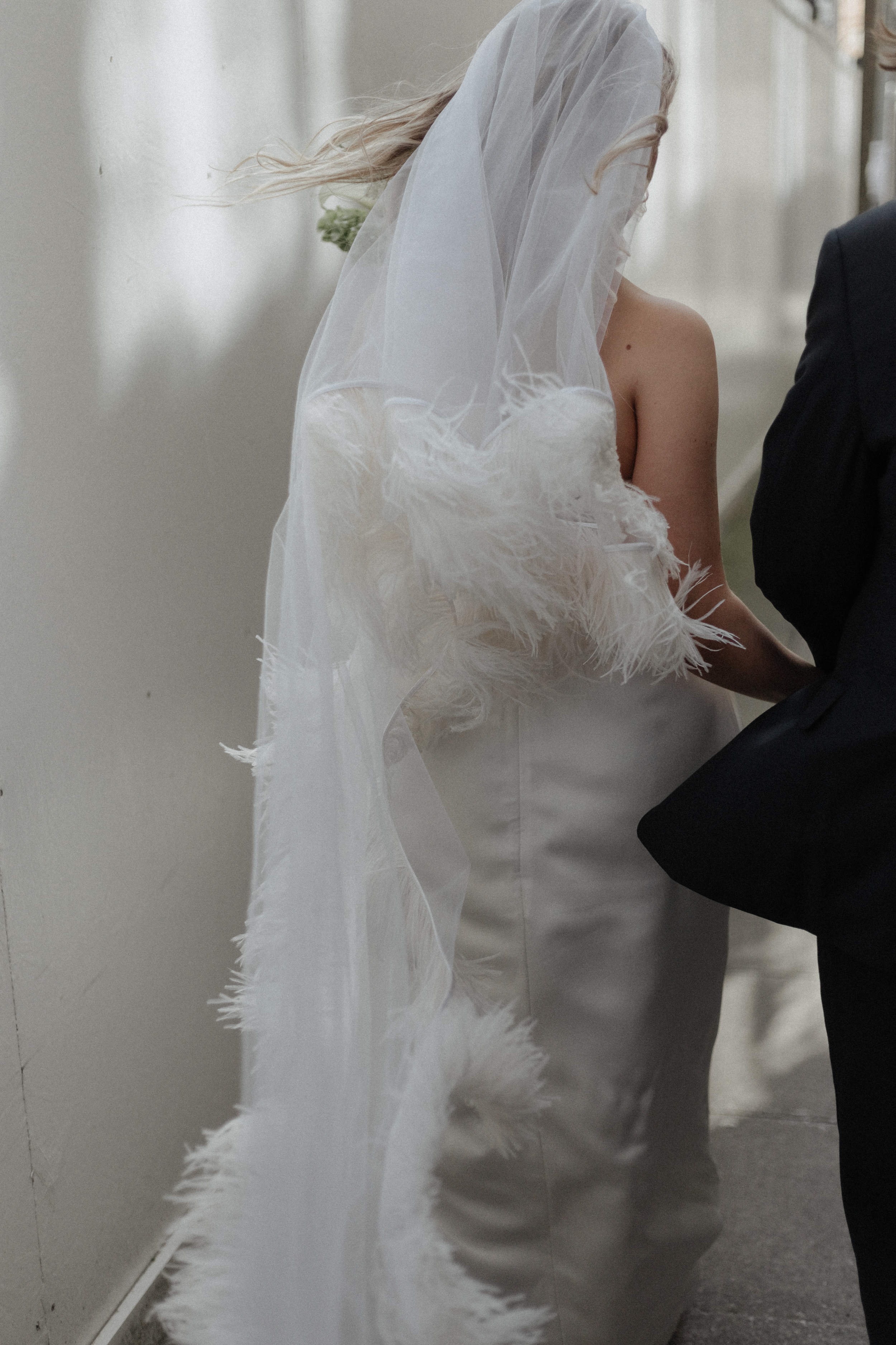 Bride wearing a fringed Christopher Kane veil.