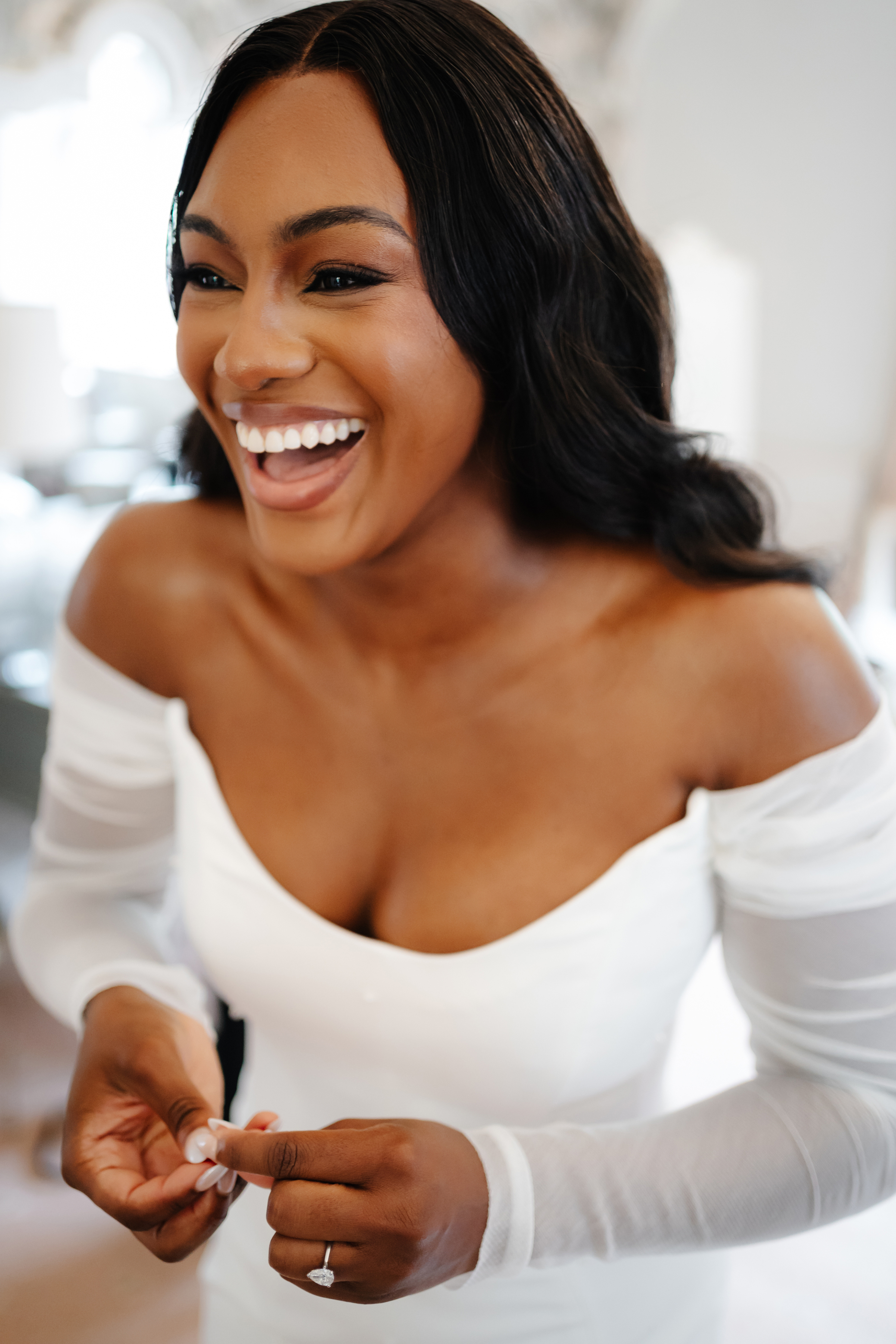 Beautiful radiant smiling and happy Black bride getting ready. on her wedding day.
