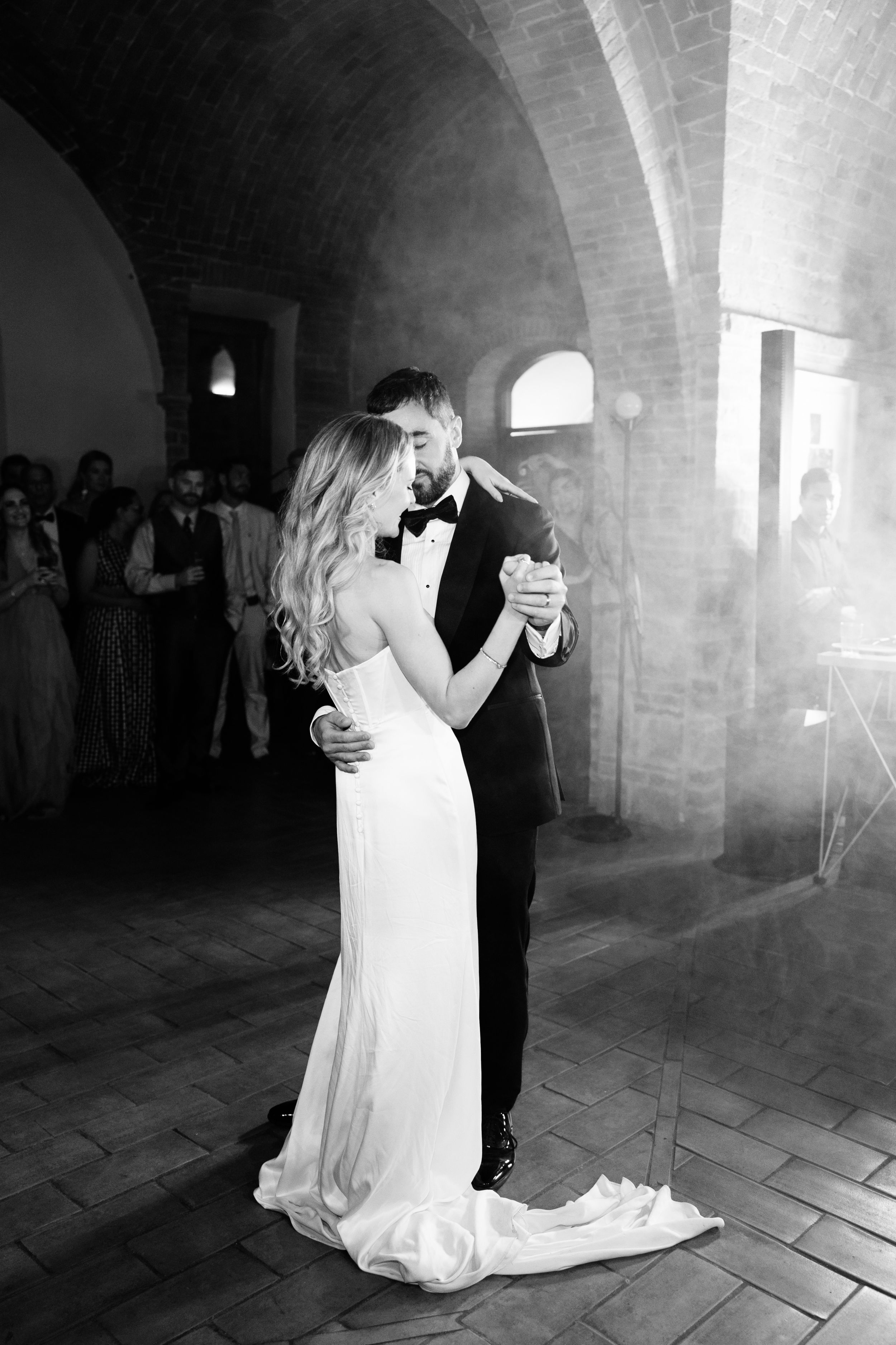 Wedding Borgo Sant Ambrogio Tuscany Italy 162 - A Modern, Romantic Destination Wedding at Borgo Sant Ambrogio in Tuscany Modern black and white wedding photography of bride and groom dancing their first dance at Borgo Sant Ambrogio in Tuscany, Italy.