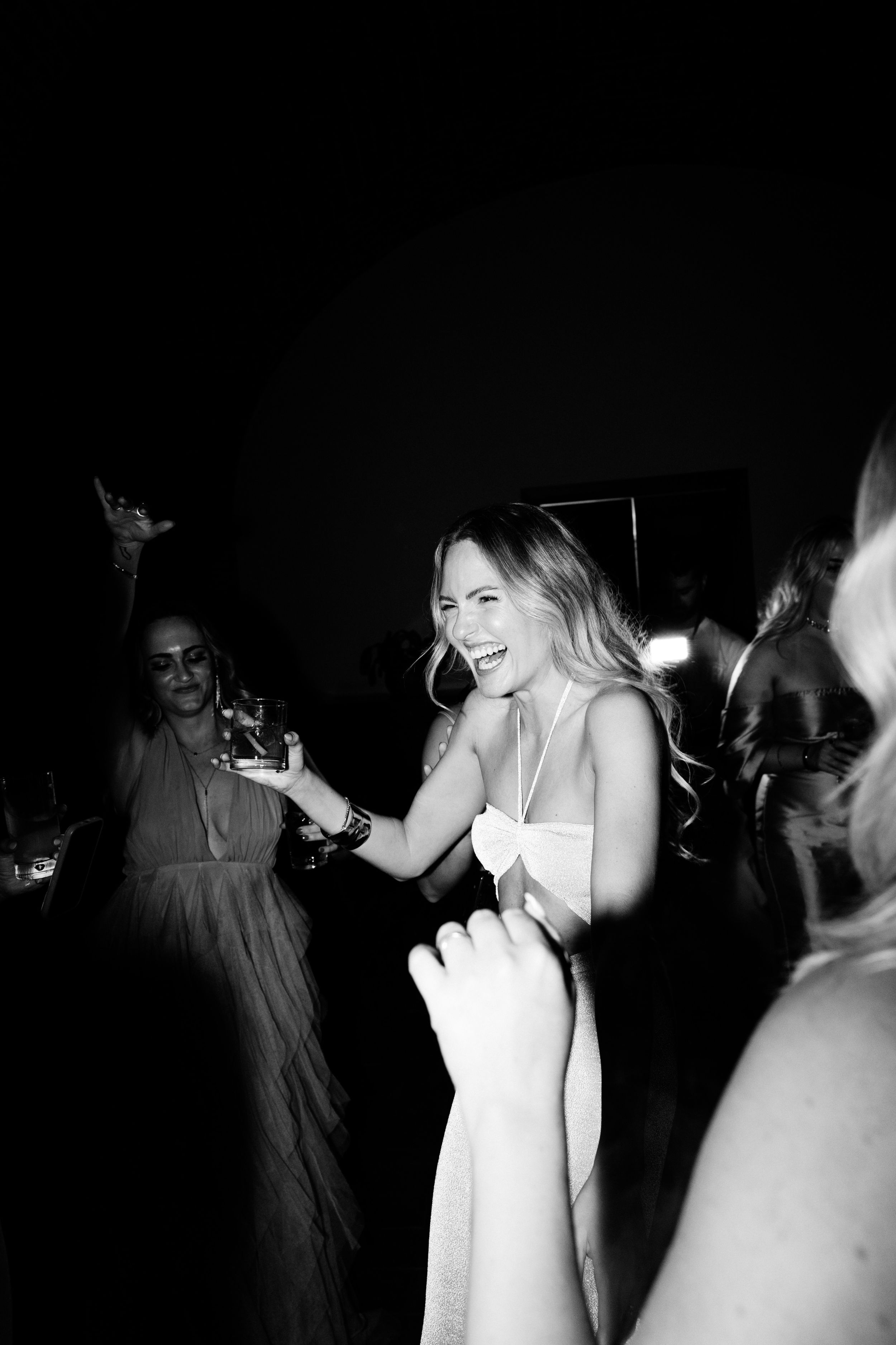 Wedding Borgo Sant Ambrogio Tuscany Italy 169 - A Modern, Romantic Destination Wedding at Borgo Sant Ambrogio in Tuscany Bride in a dress with a middriff cut-out for the evening of her wedding.