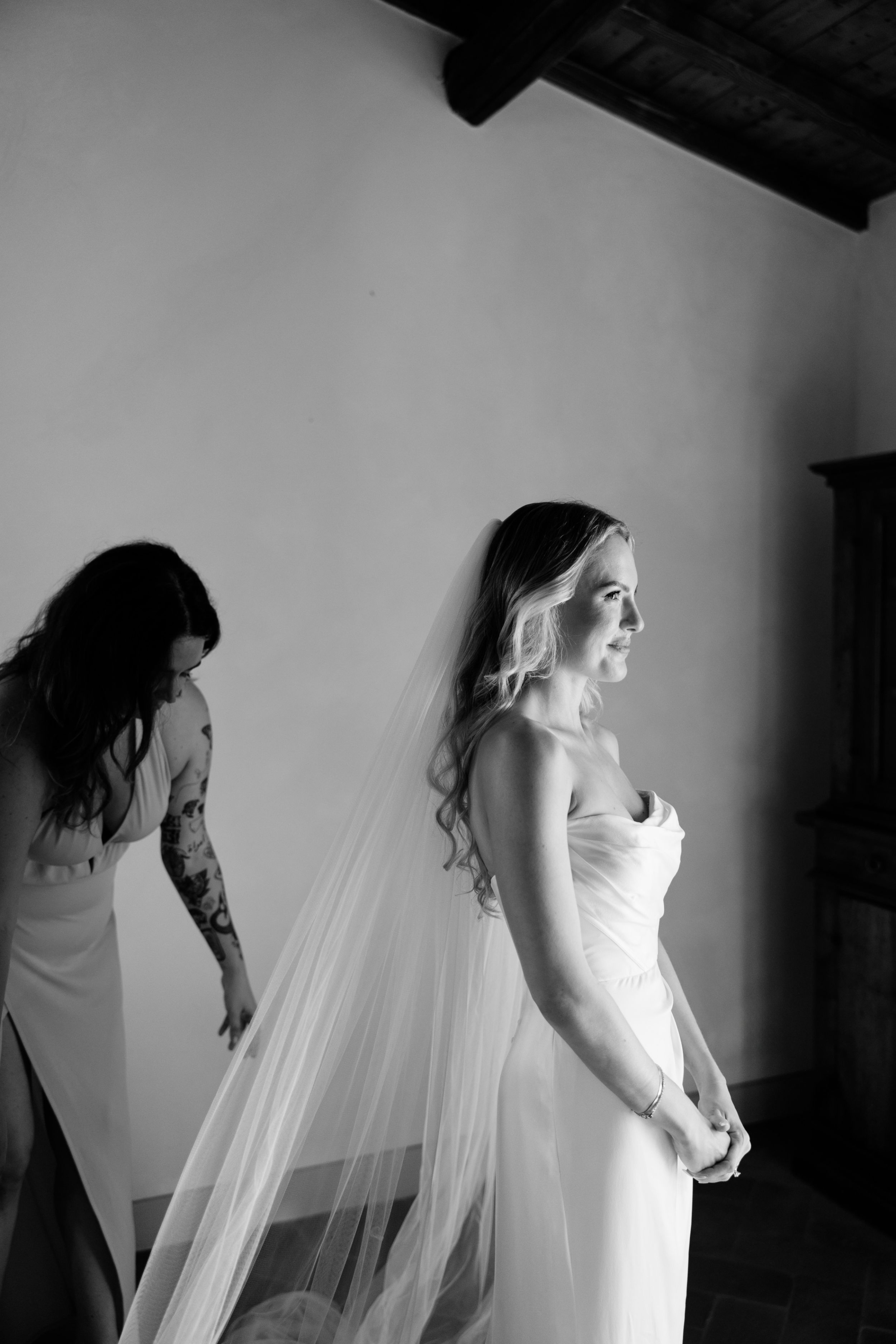 Wedding Borgo Sant Ambrogio Tuscany Italy 34 - A Modern, Romantic Destination Wedding at Borgo Sant Ambrogio in Tuscany Bride at Views from Borgo Sant Ambrogio in Tuscany getting ready in her Martina Liana dress.