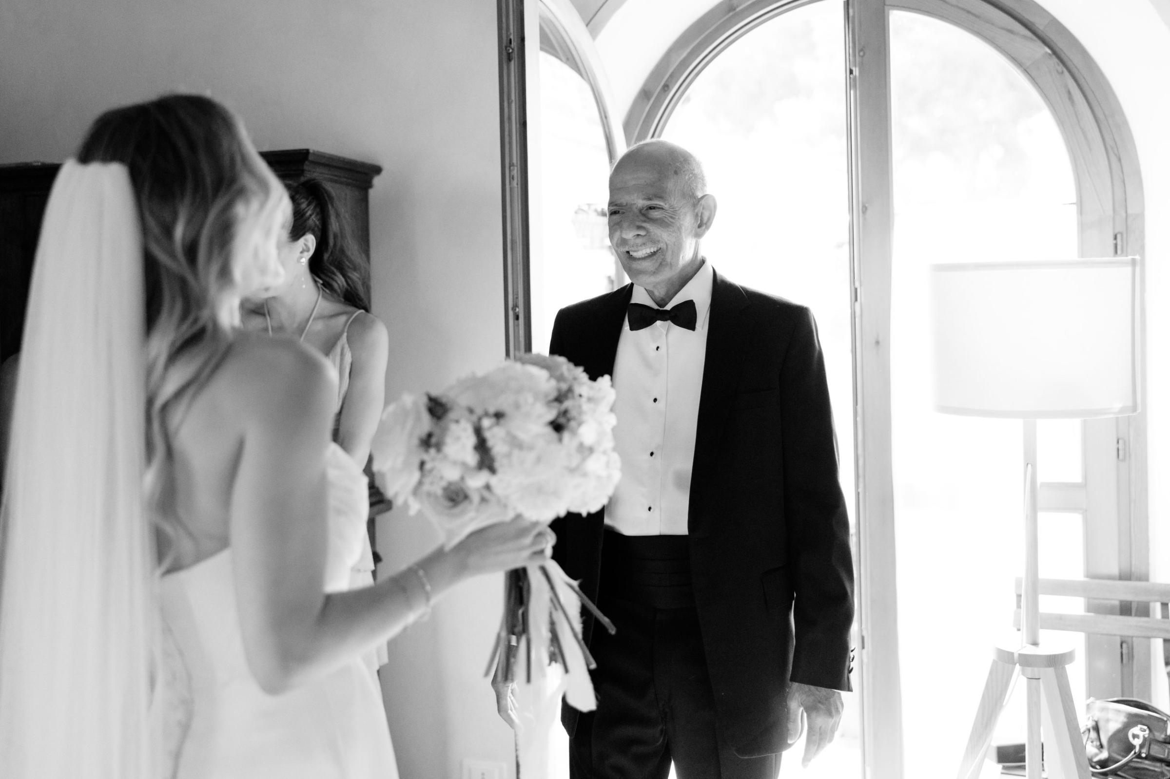 Wedding Borgo Sant Ambrogio Tuscany Italy 46 - A Modern, Romantic Destination Wedding at Borgo Sant Ambrogio in Tuscany Father of the bride seeing his daughter for the first time in her Martina Liana wedding dress.