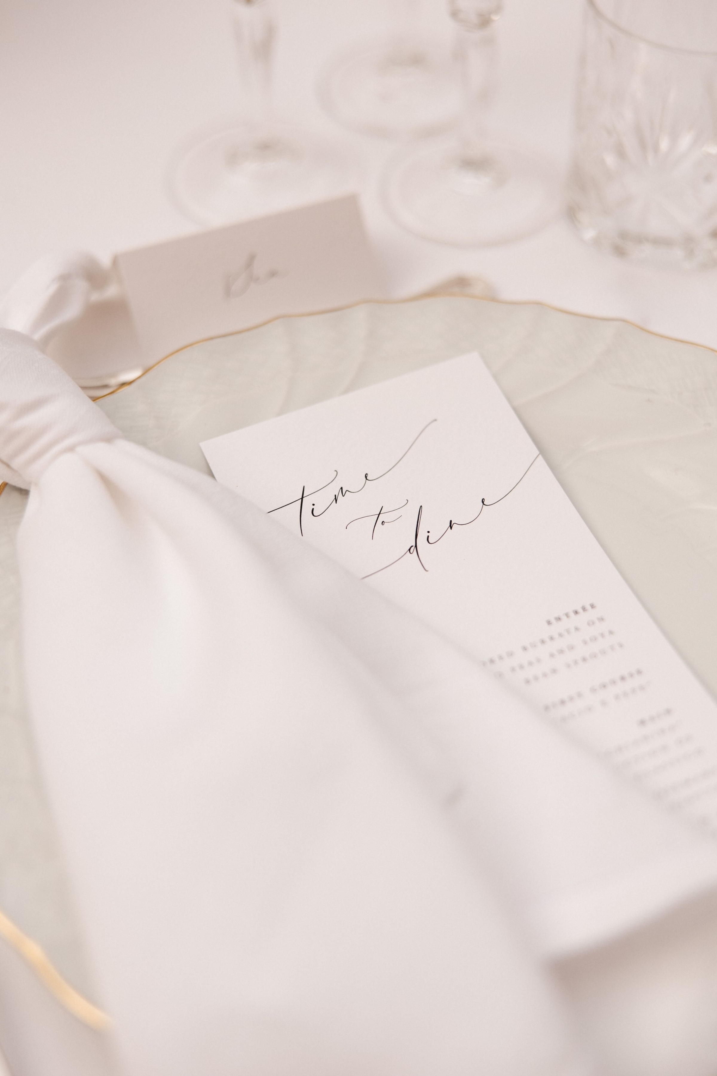Wedding Borgo Sant Ambrogio Tuscany Italy 82 - A Modern, Romantic Destination Wedding at Borgo Sant Ambrogio in Tuscany Elegant white tableware, modern minimalist wedding menu and white napkin.