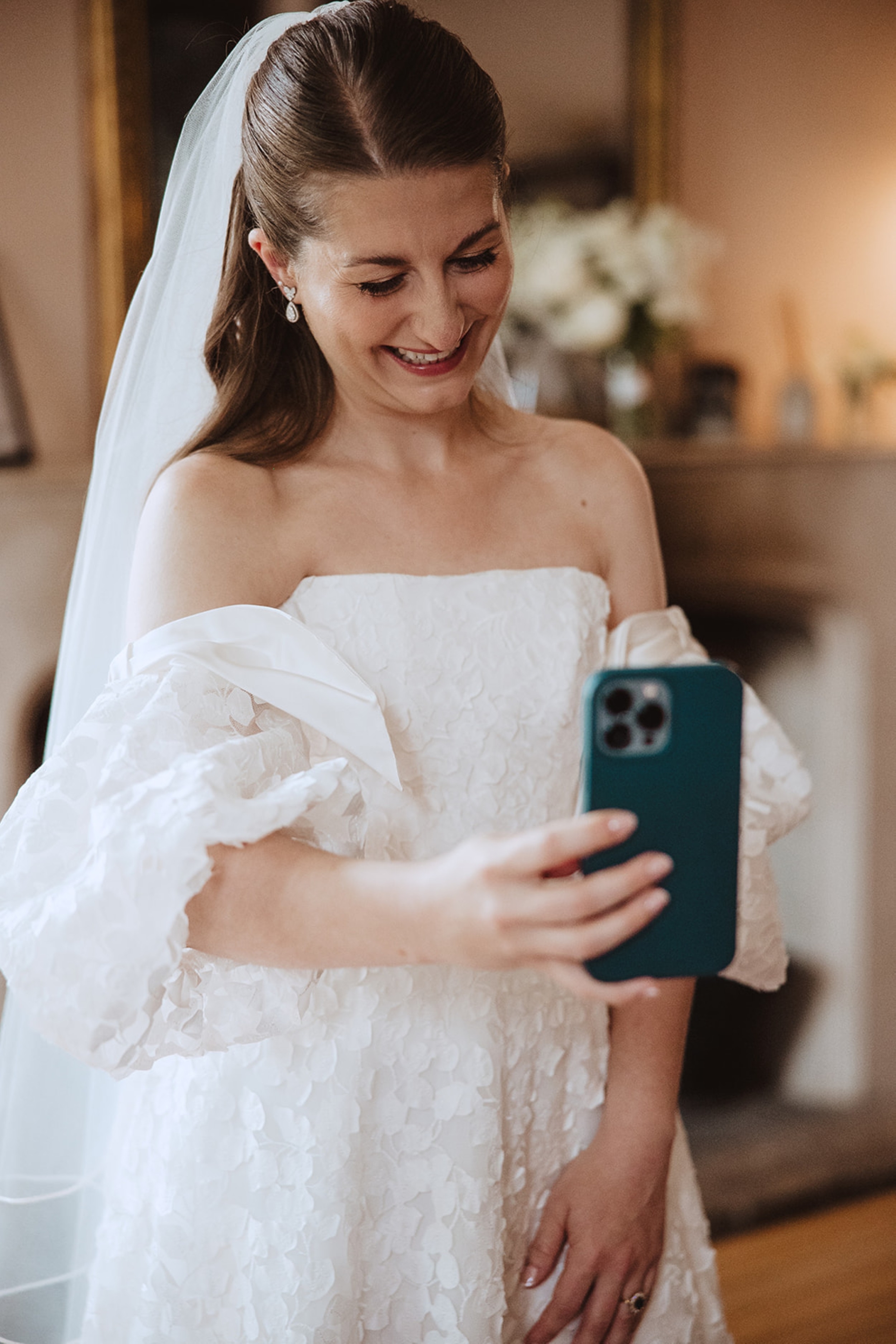 Bore Place Wedding Sassi Holford bride 34 - Hatty & Ben’s Nancy Meyers Inspired Black Tie Wedding at Bore Place, Kent Bride sat weeping as she reads a hand-written note on the morning of her wedding.
