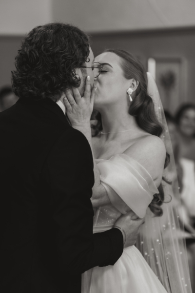 Bride & groom share first kiss