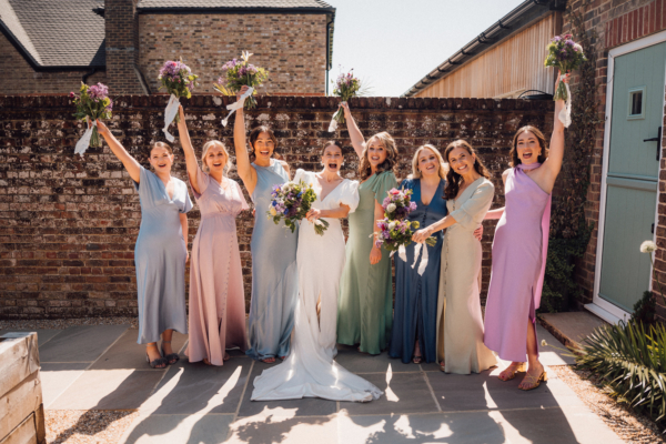 Amelia and Tobias’ Cissbury Wedding with a Puff Sleeved Dress & Bridesmaids in Pastel
