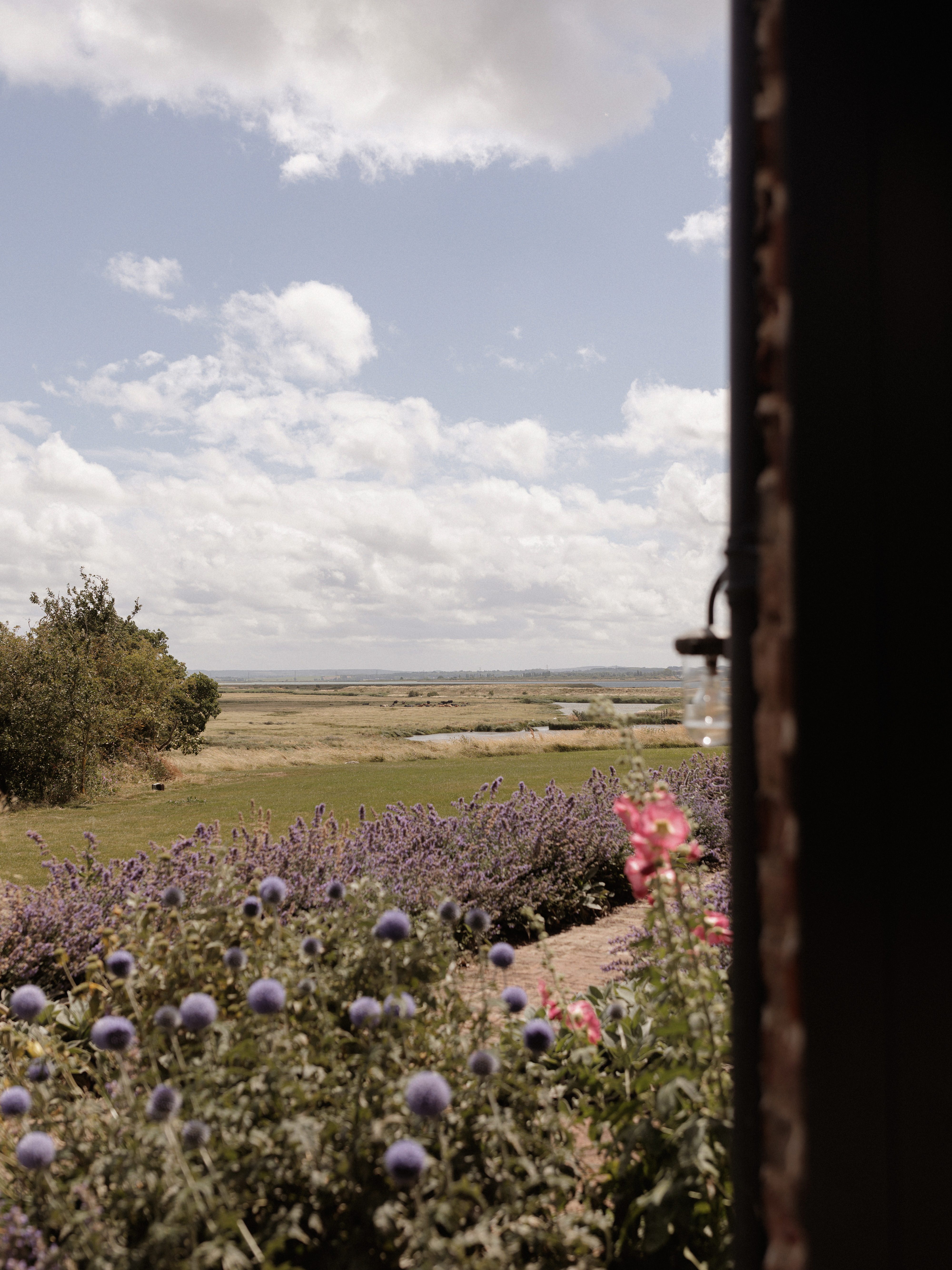 A Summer Wedding at Elmley Nature Reserve with Halfpenny London 43 Views from Elmley Nature Reserve wedding venue in Kent.