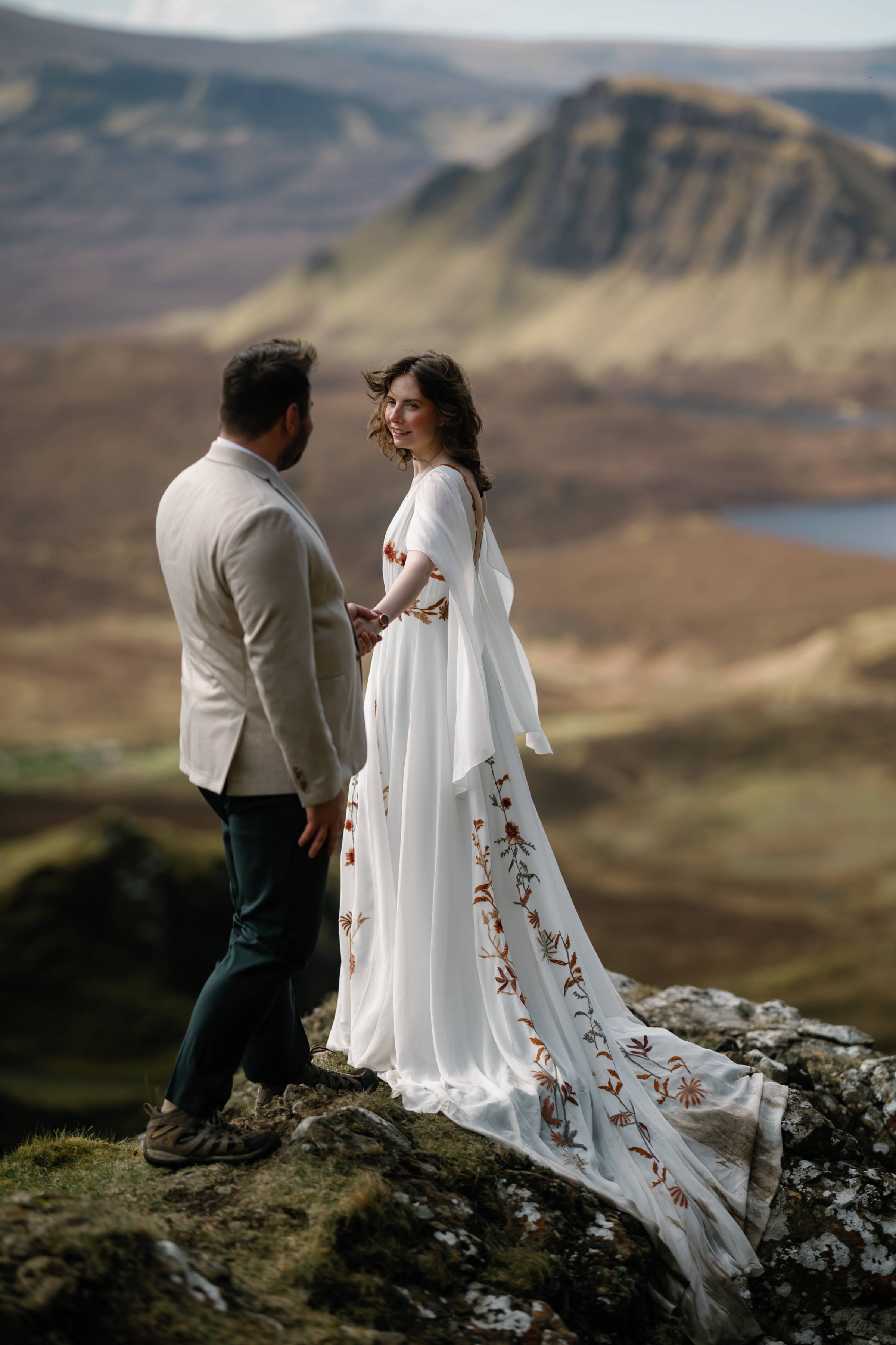 Oli and Steph Photography Miranda and Zach 69 - An Isle of Skye Elopement Planned in Just One Month, with a Floral Dress by Flora & Lane Elopement Quiraing, Isle of Skye, Scotland. Bride wears a floral wedding dress by Flora & Lane. Photography by Oli & Steph.