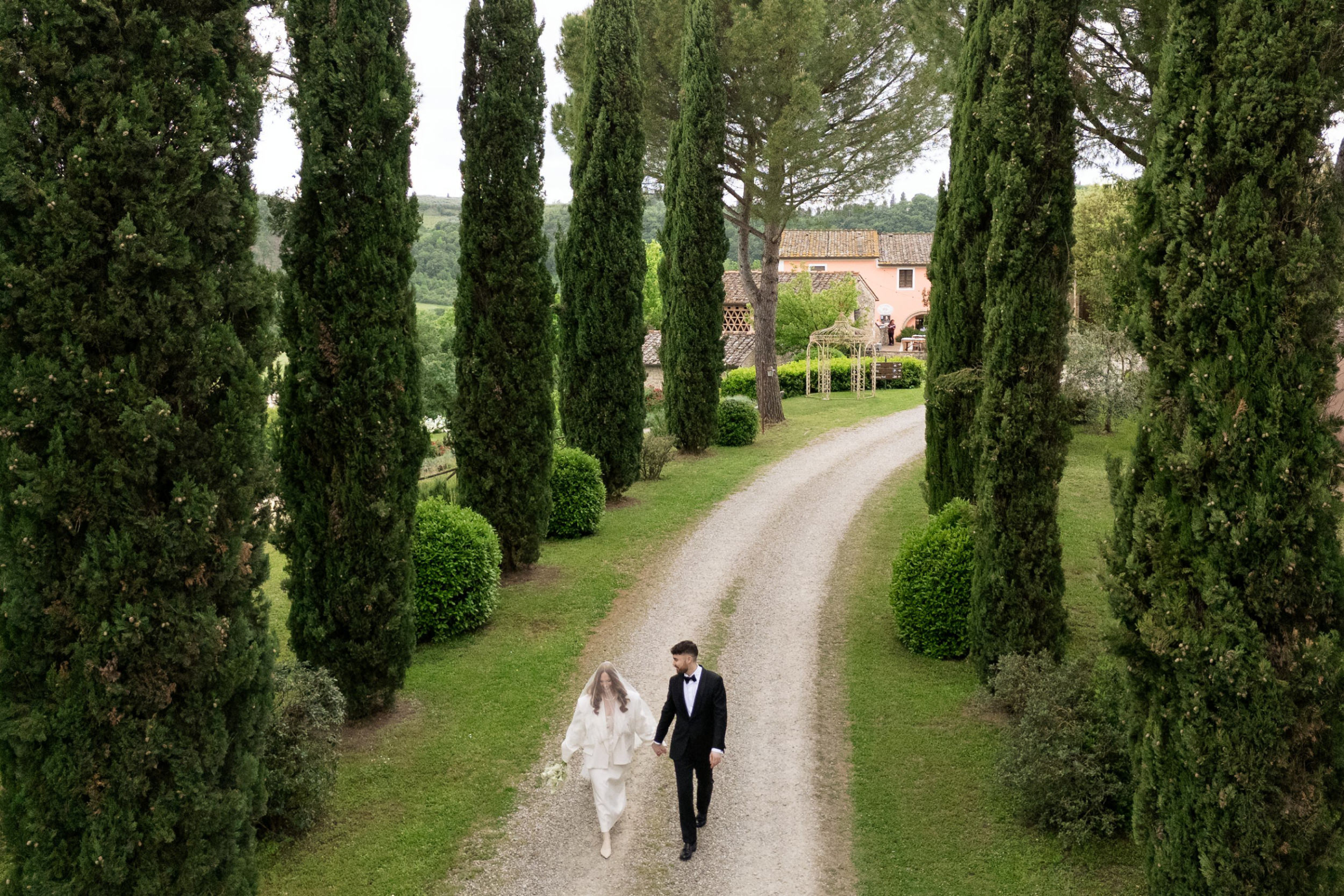 An Arakii Suit with Oversized Jacket for a Chic Italian Wedding at Antico Borgo 75 Wedding at Antico Borgo San Lorenzo in Poggibonsi, Italy.