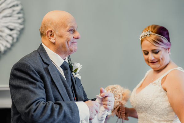 Emotional father and bride moment before the ceremony - heartfelt wedding photography by Calini Weddings.