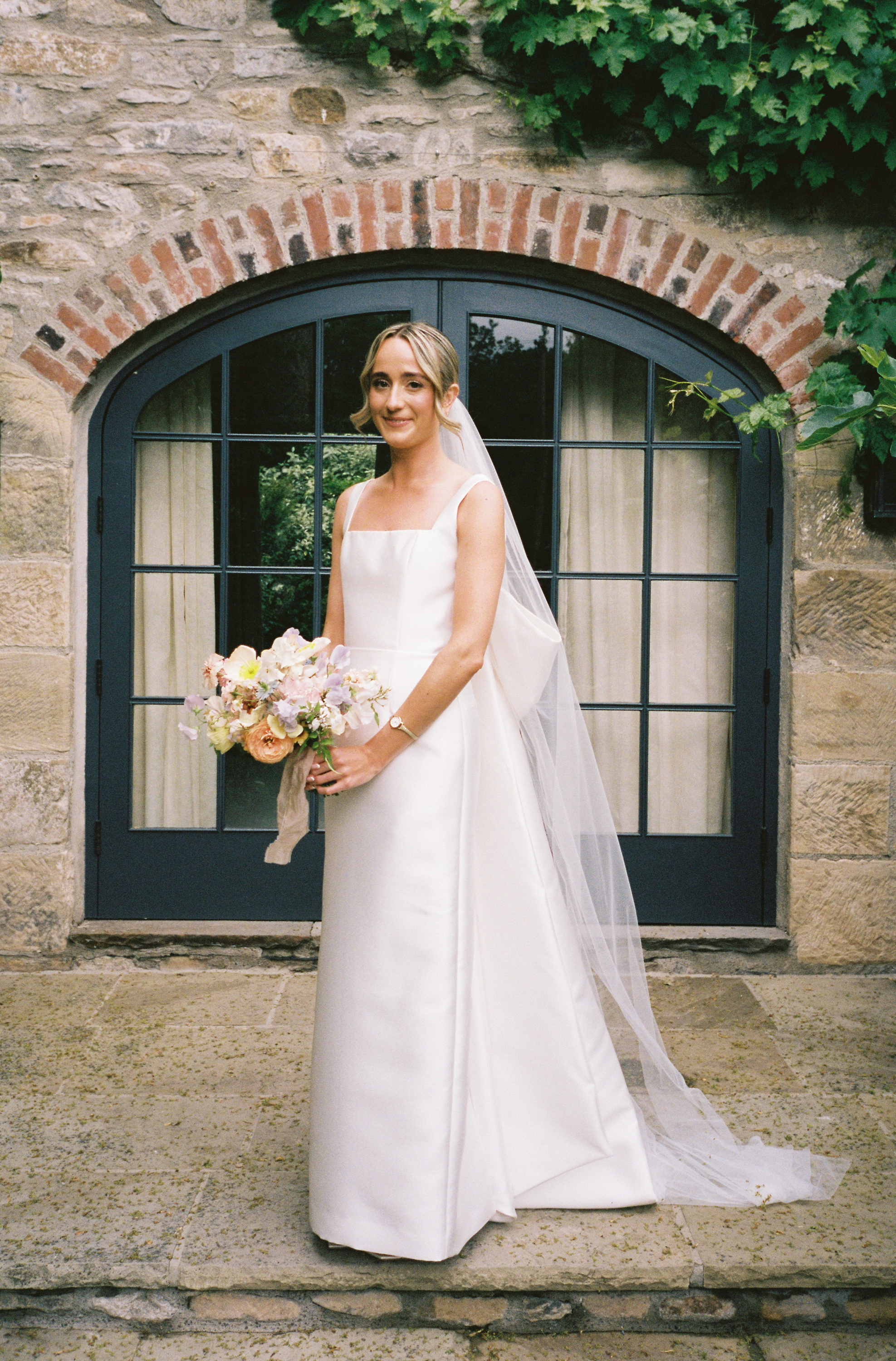 Maisie Wore Jessica Bennett for Her Spring Pastel Flower Filled Wedding at Middleton Lodge 35 Spring Pastel Church Wedding Middleton Lodge Feverfew Florist Nell Mallia Photography89