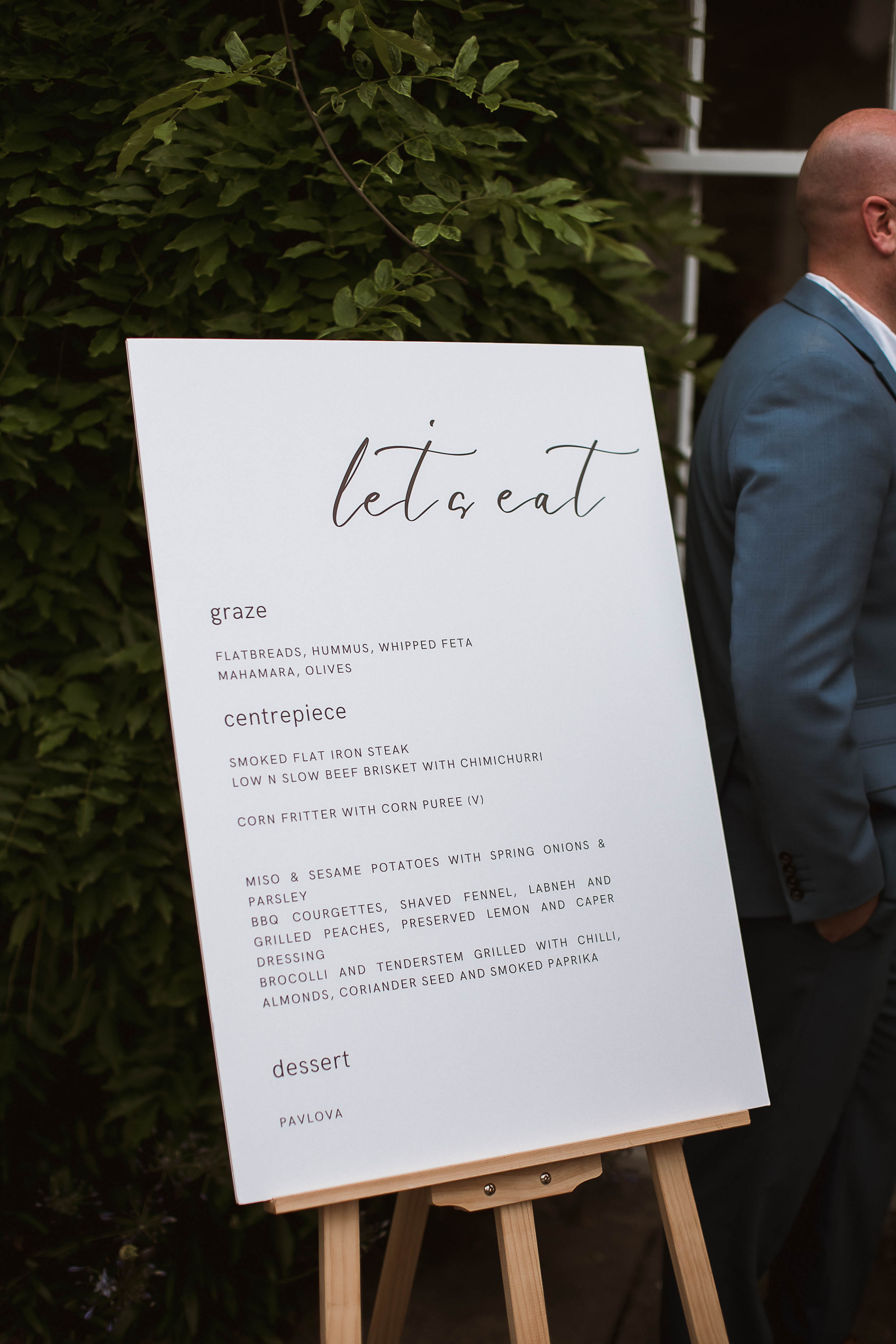 Boconnoc Estate Wedding Cornwall Jesus Peiro 128 - Lauren in Jesus Peiro for her Elegant Boconnoc Estate Wedding in Cornwall Wedding signage on a wooden easel.
