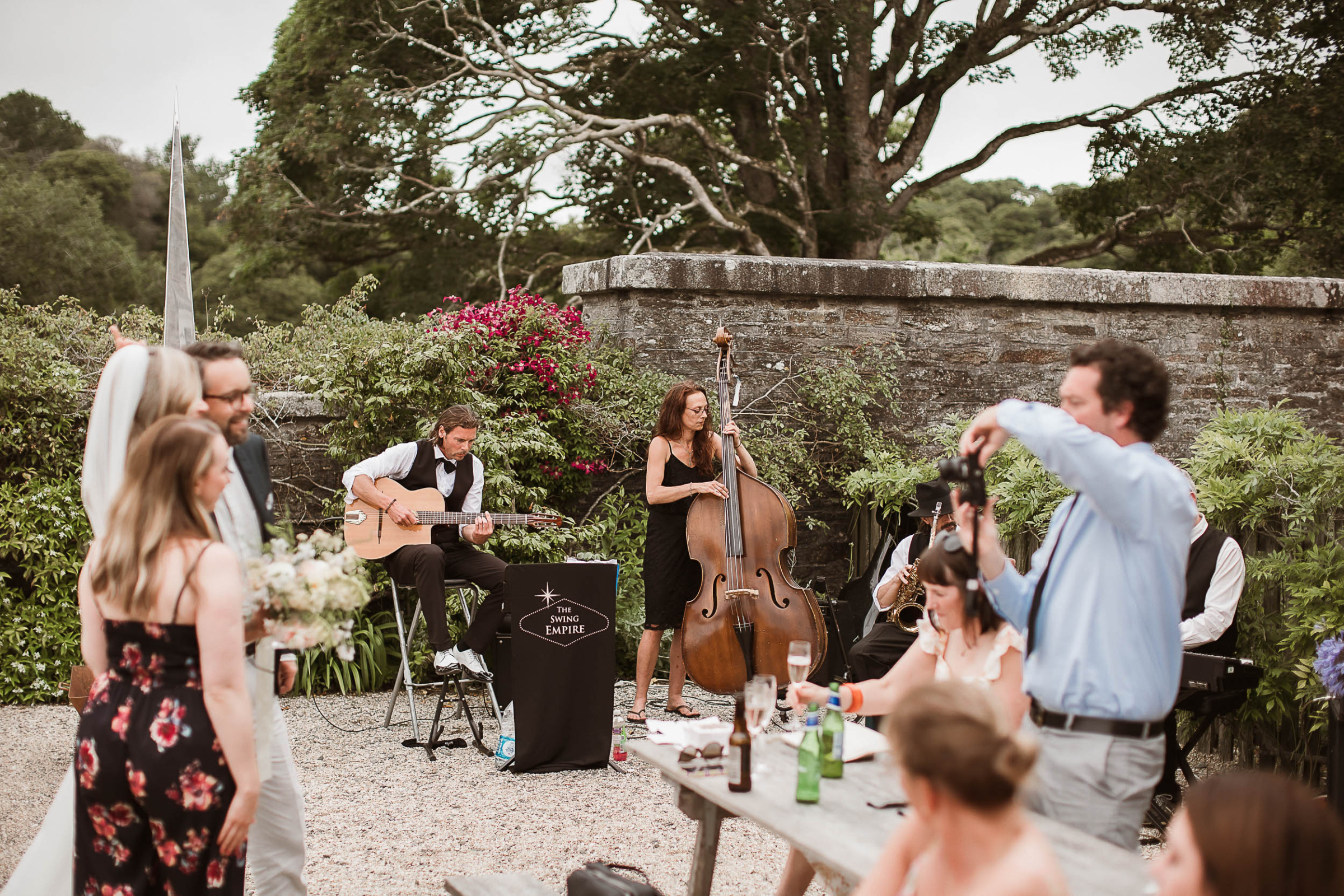 Boconnoc Estate Wedding Cornwall Jesus Peiro 130 - Lauren in Jesus Peiro for her Elegant Boconnoc Estate Wedding in Cornwall String musicians playing at a wedding.