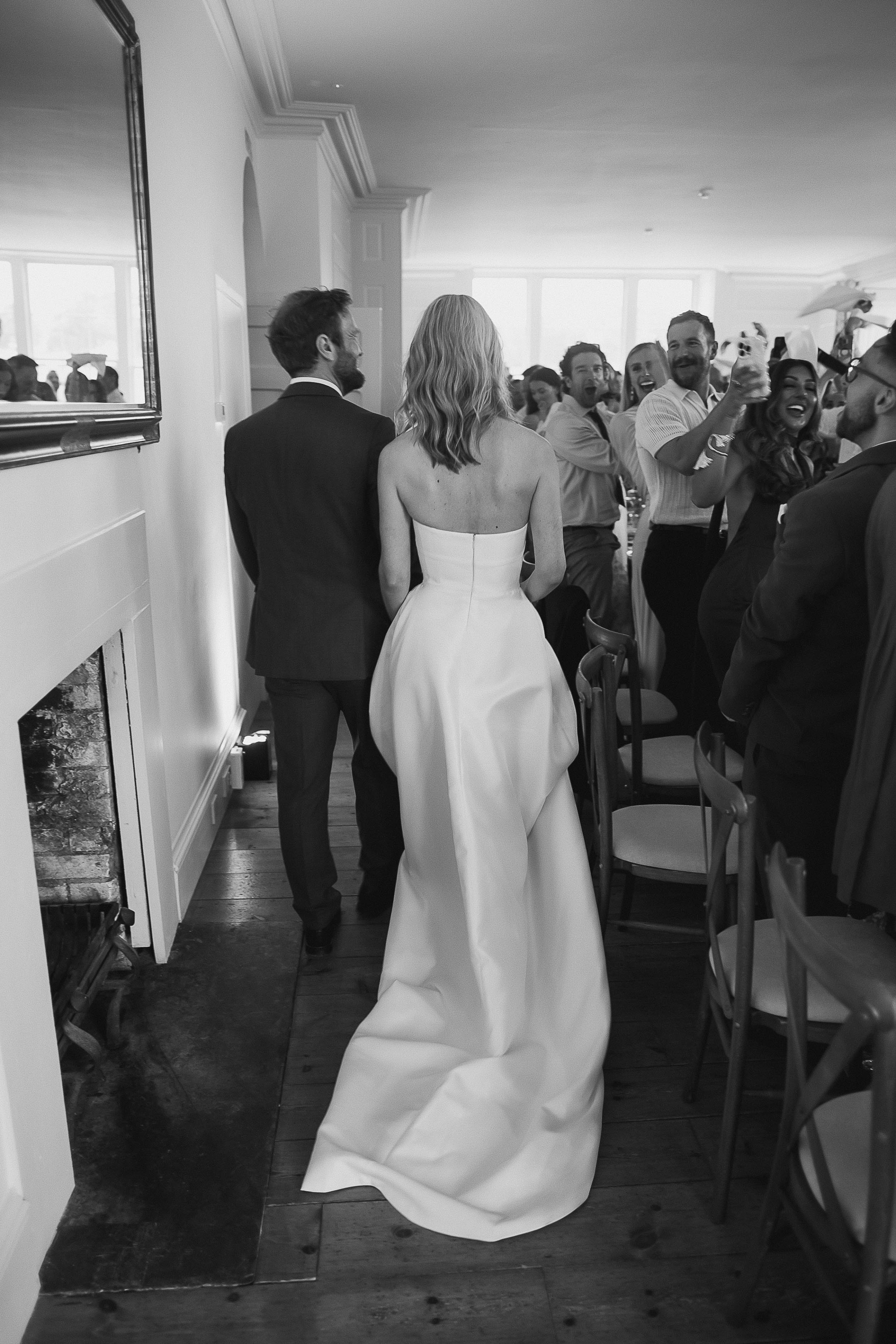 Boconnoc Estate Wedding Cornwall Jesus Peiro 147 - Lauren in Jesus Peiro for her Elegant Boconnoc Estate Wedding in Cornwall Joyful bride in a Jesus Peiro dress and groom arrive at their wedding reception at Boconnoc Estate.