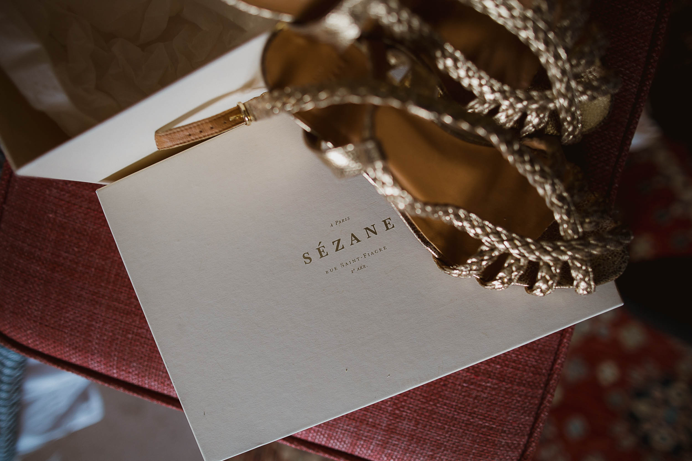 Boconnoc Estate Wedding Cornwall Jesus Peiro 19 - Lauren in Jesus Peiro for her Elegant Boconnoc Estate Wedding in Cornwall Flatlay shot of a pair of gold Sezane wedding shoes.