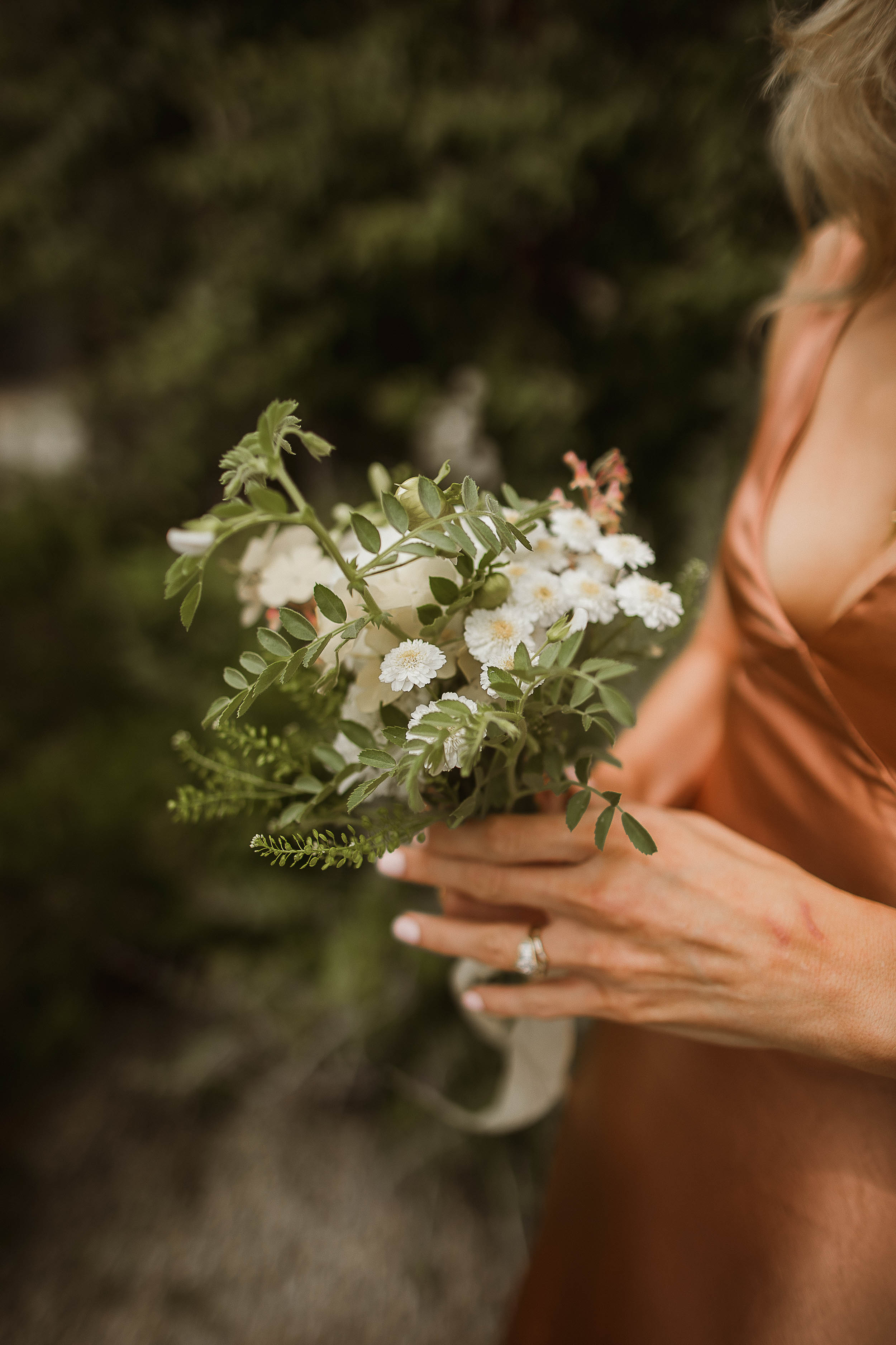 Boconnoc Estate Wedding Cornwall Jesus Peiro 57 - Lauren in Jesus Peiro for her Elegant Boconnoc Estate Wedding in Cornwall Elegant small bridesmaids bouquet of Feverfew and green leaves.