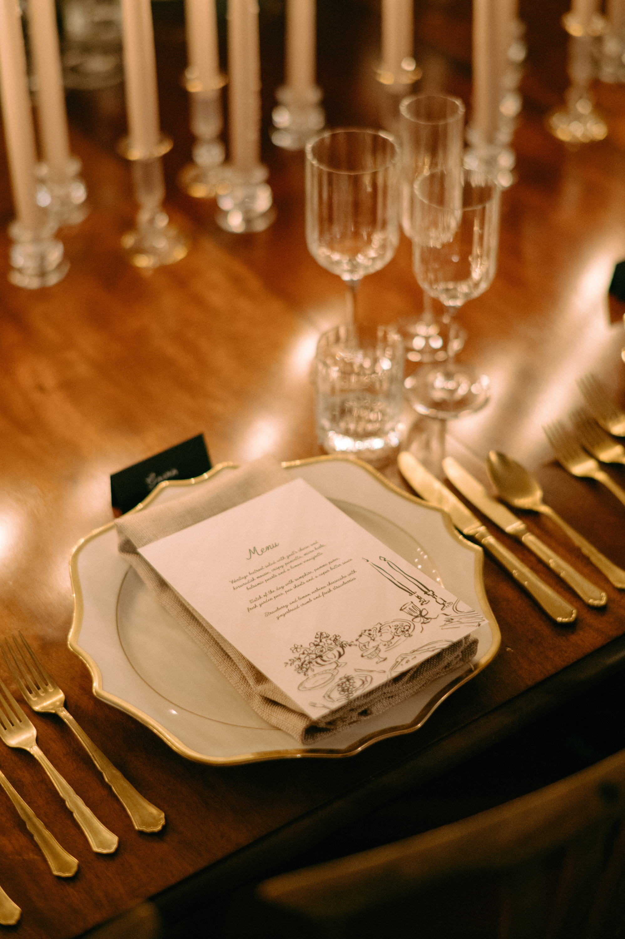 Earnshill House Wedding Editorial Fern Godfrey Weddings 65 - Modern Bridal Elegance at Earnshill House, A Romantic Somerset Wedding Venue Elegant gold rimmed plate with gold cutlery and simple stationery. Earnshill House Somerse wedding venue editorial.