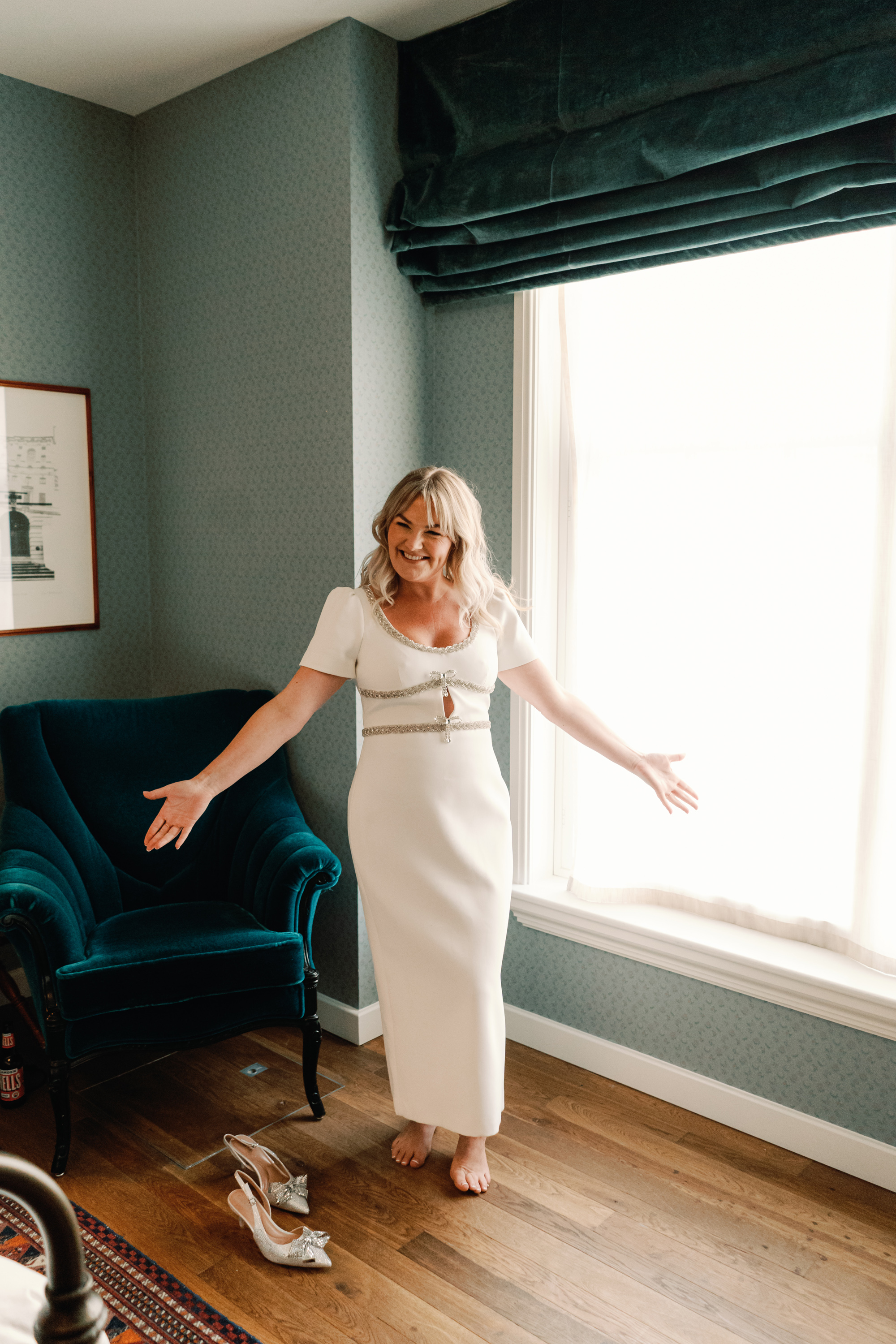 Emmylou Kelly Registry Office Wedding Jessica Lily Photography 82 - Photographer Emmylou Kelly & Paul's Intimate Family Registry Office Wedding Bride looking happy and excited to step into her sparkly wedding day shoes.