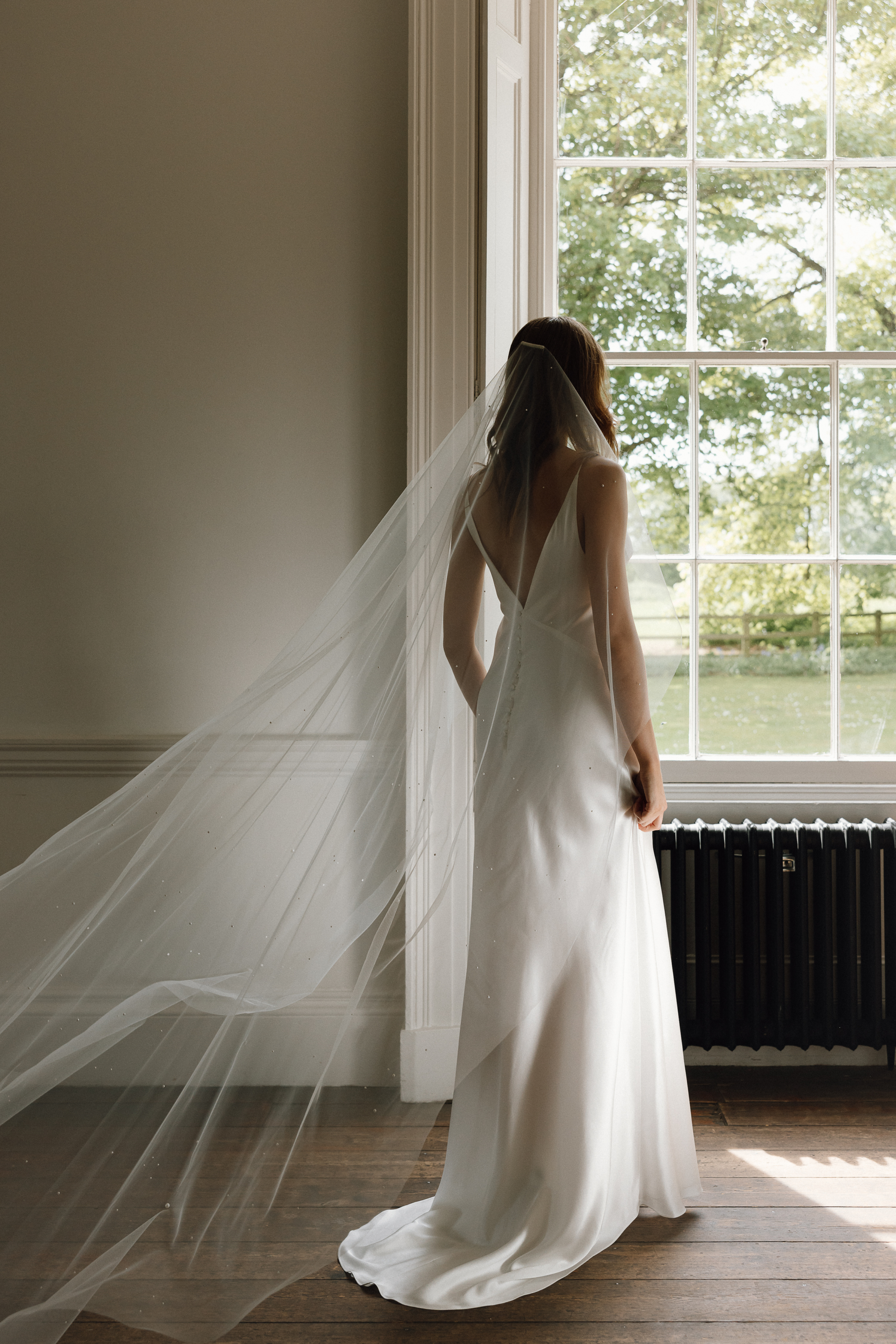 Ixia silk wedding gown by KateBeaumont 2025 IndiaHobson HR 114 - Kate Beaumont: Lovingly Handmade Silk Wedding Dresses Silk wedding slip dress and veil by Kate Beamont.