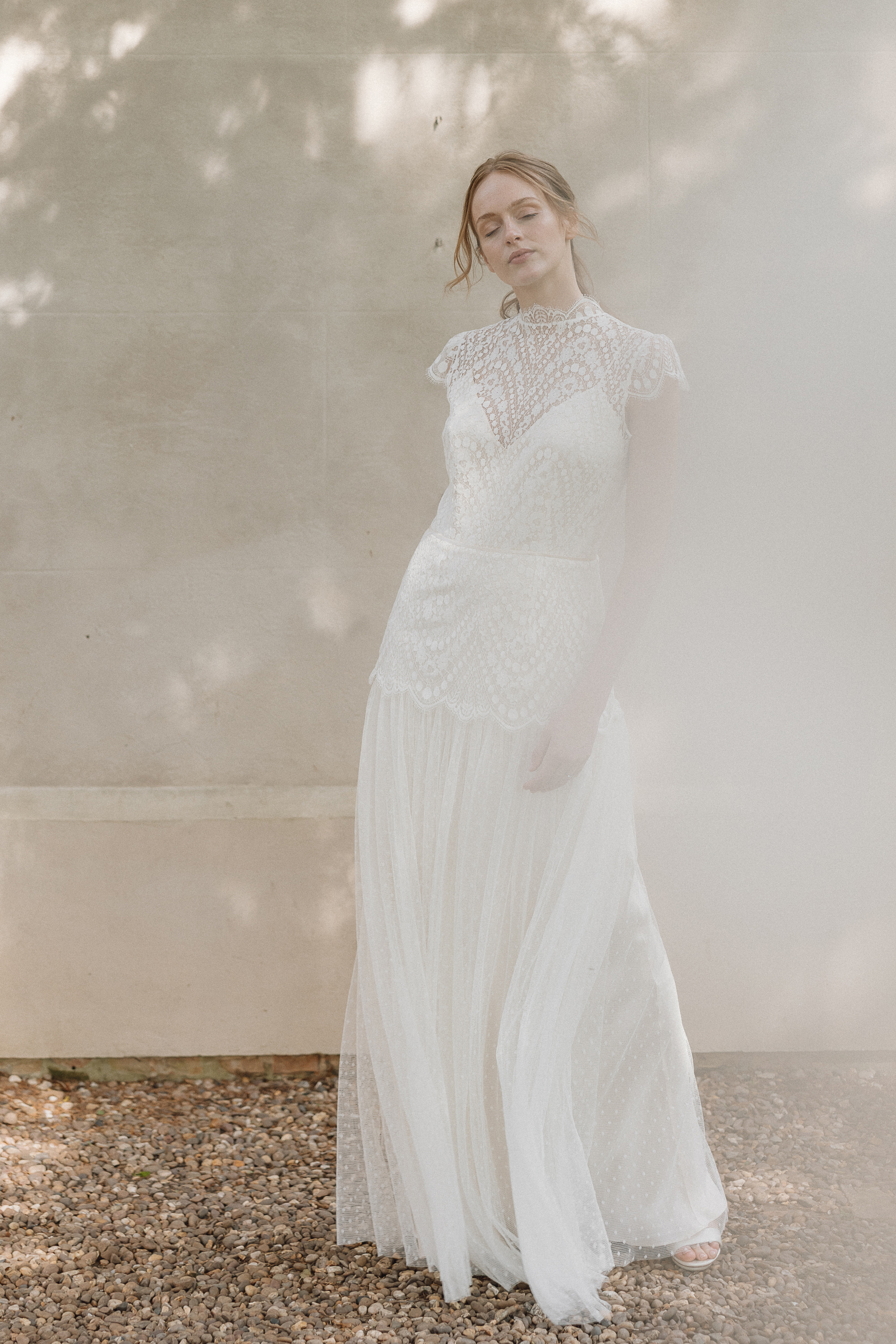 Modern vintage inspired silk, tulle and and lace wedding dress by Kate Beaumont.