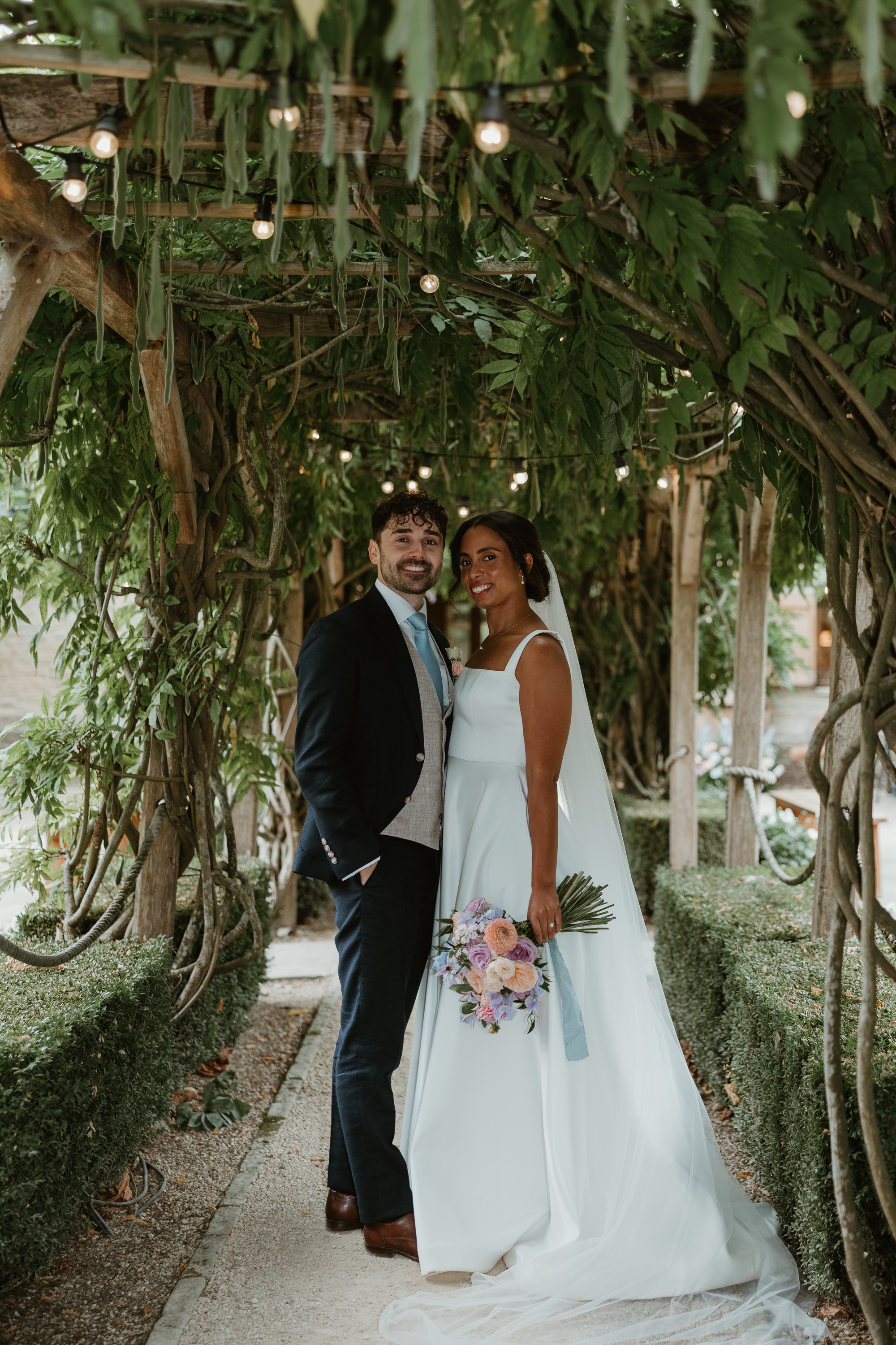 The New Wedding Aesthetic: A Sense of Home 45 Mixed race couple on their wedding dat at Tythe, Oxfordshire barn wedding venue.