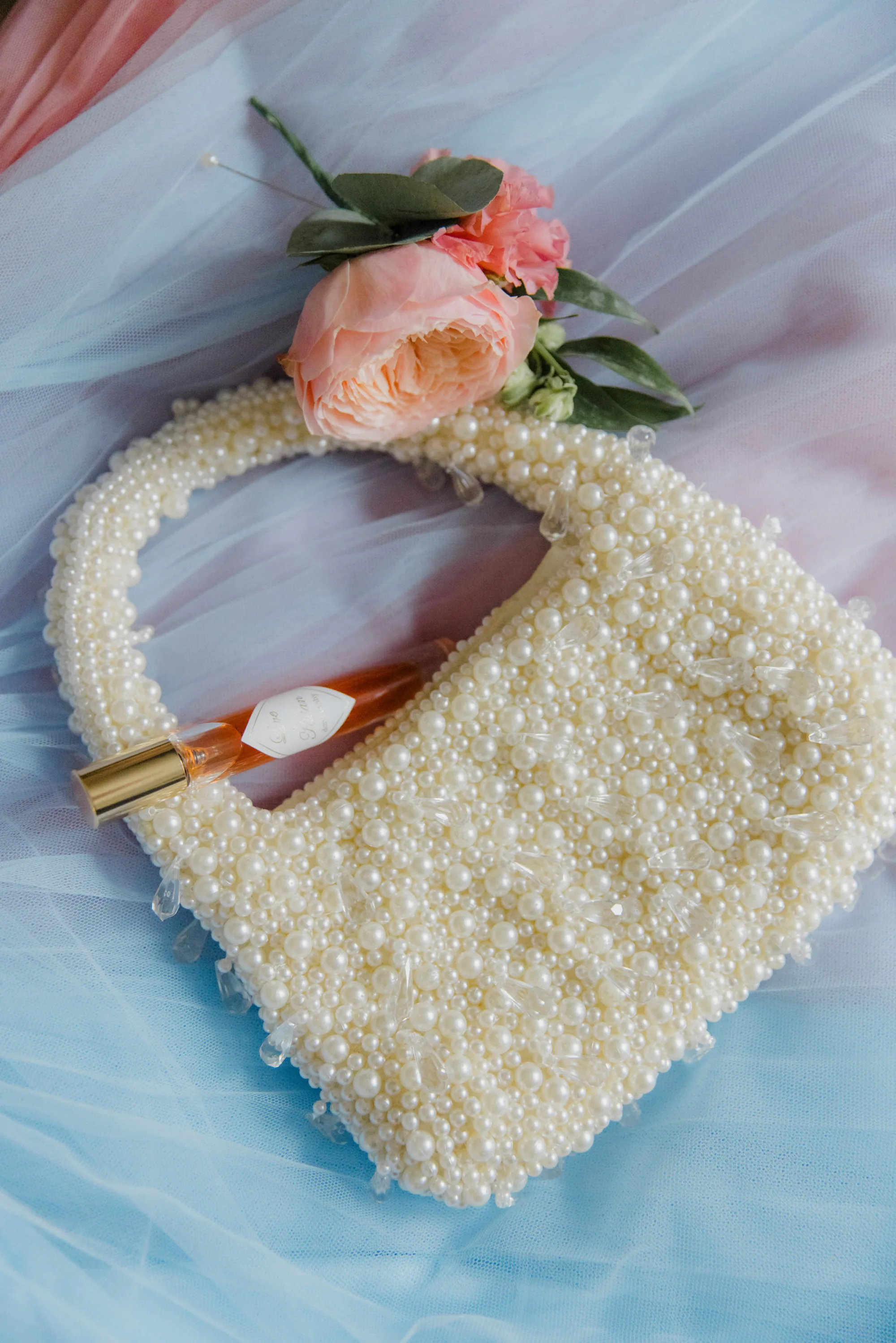 Colouful Folkerton Mill Wedding Lanark Scotland 212 - A Colourful, Relaxed Family Wedding at Folkerton Mill in Lanark, Scotland Pearl bridal clutch bag.