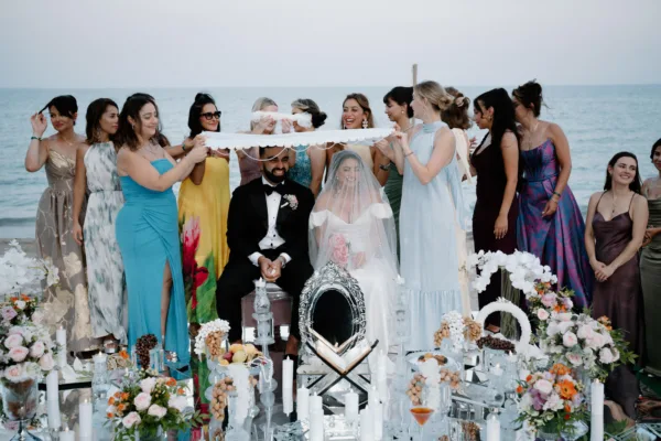 Persian Sofreh Aghd wedding ceremony on beach in Antalya Turkey with sugar cloth tradition planned by Ramarossi