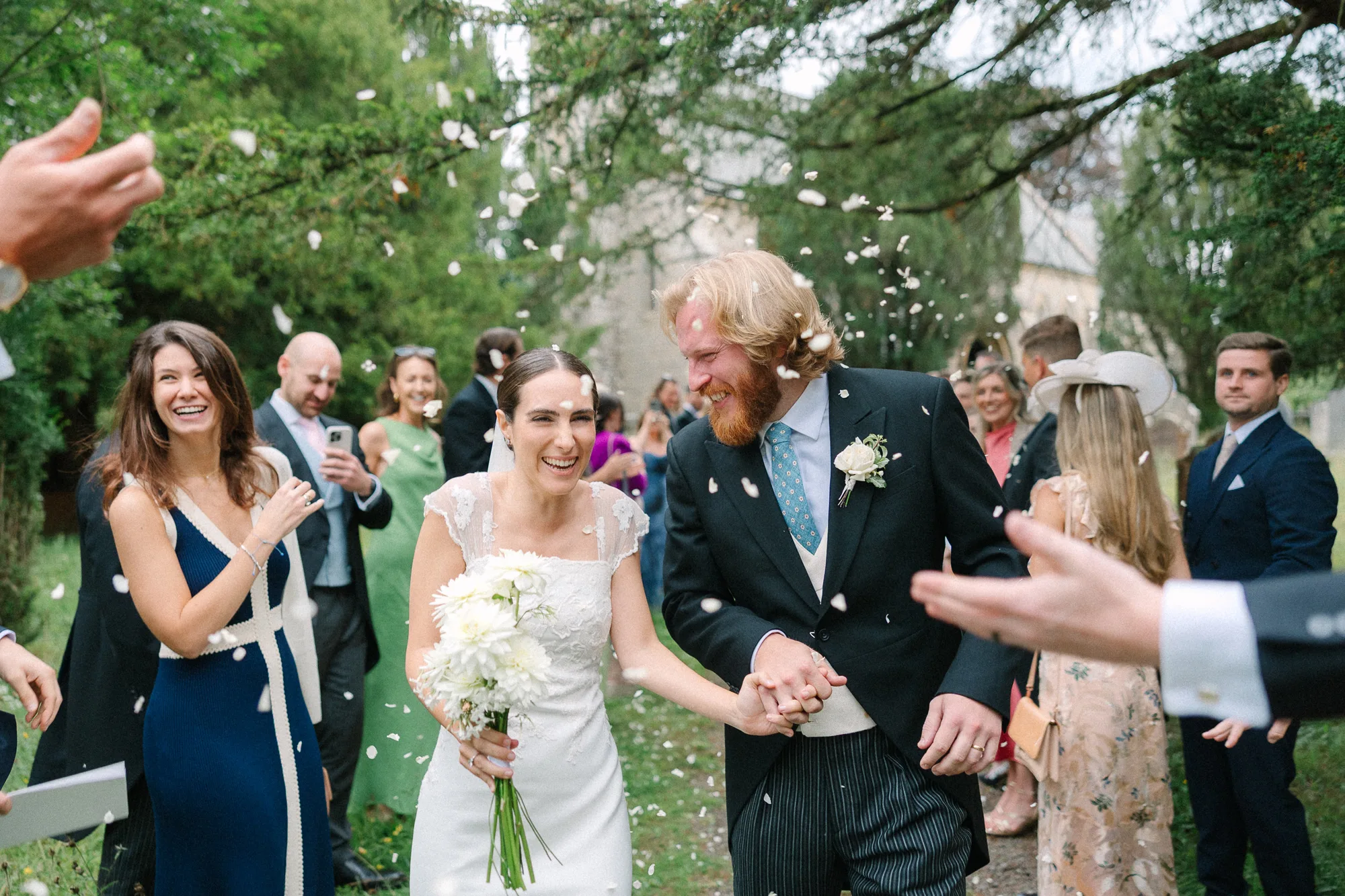 Mediterranean Inspired Quintessentially English Garden Wedding 60 - A Delightful Mediterranean Inspired, English Garden Wedding Bride and groom being showered in confetti on their quintessentially English country garden wedding day.