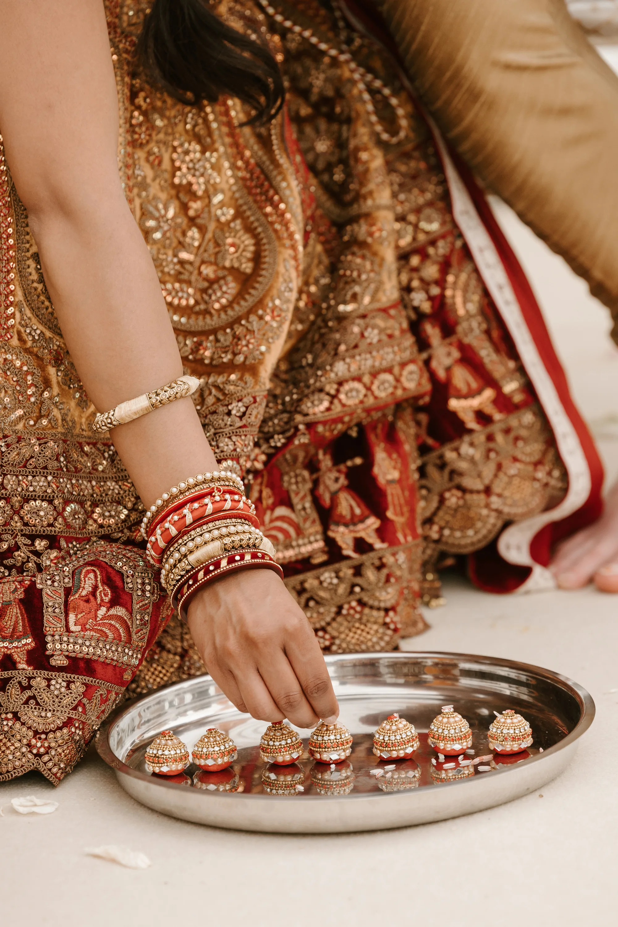 Fusion HIndu Wedding Newburgh Priory 33 - Hema & Will's Fusion Wedding & Hindu Ceremony at Newburgh Priory Sweet Mitha treats during a Hindu wedding ceremony.