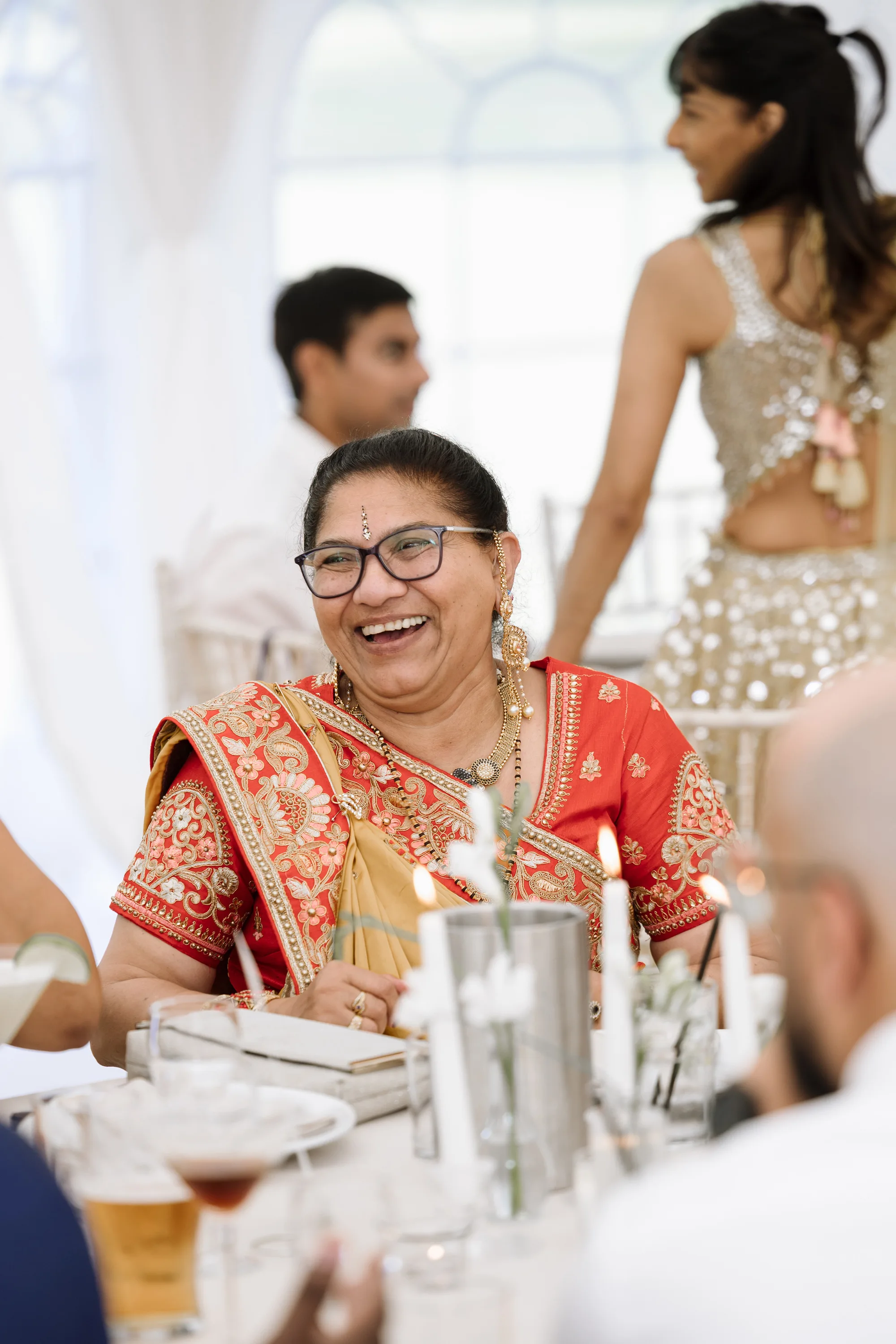 Fusion HIndu Wedding Newburgh Priory 90 - Hema & Will's Fusion Wedding & Hindu Ceremony at Newburgh Priory Guest at a Hindu wedding ceremony in traditional Hindu attire.