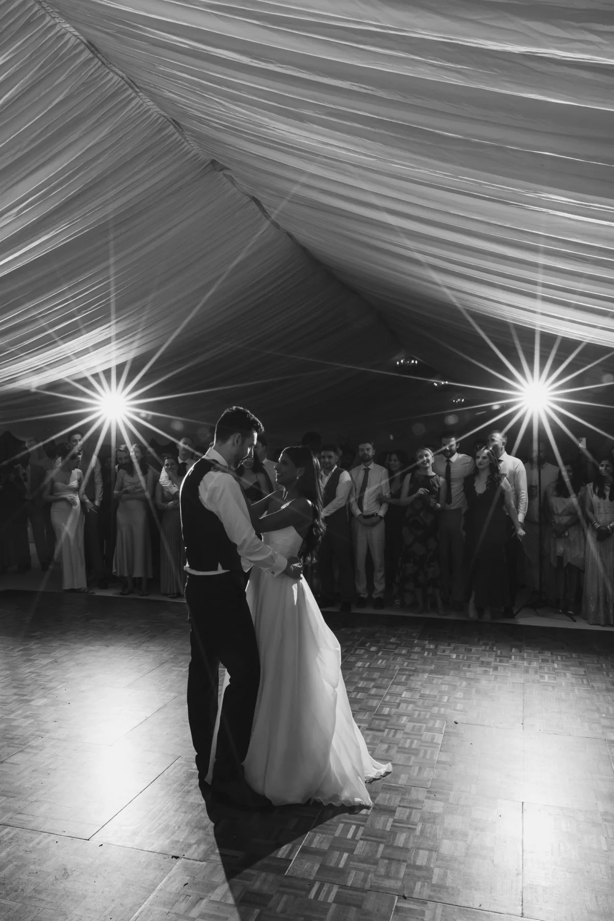 Fusion HIndu Wedding Newburgh Priory 95 - Hema & Will's Fusion Wedding & Hindu Ceremony at Newburgh Priory Bride and groom on the dance floor inside wedding marquee.