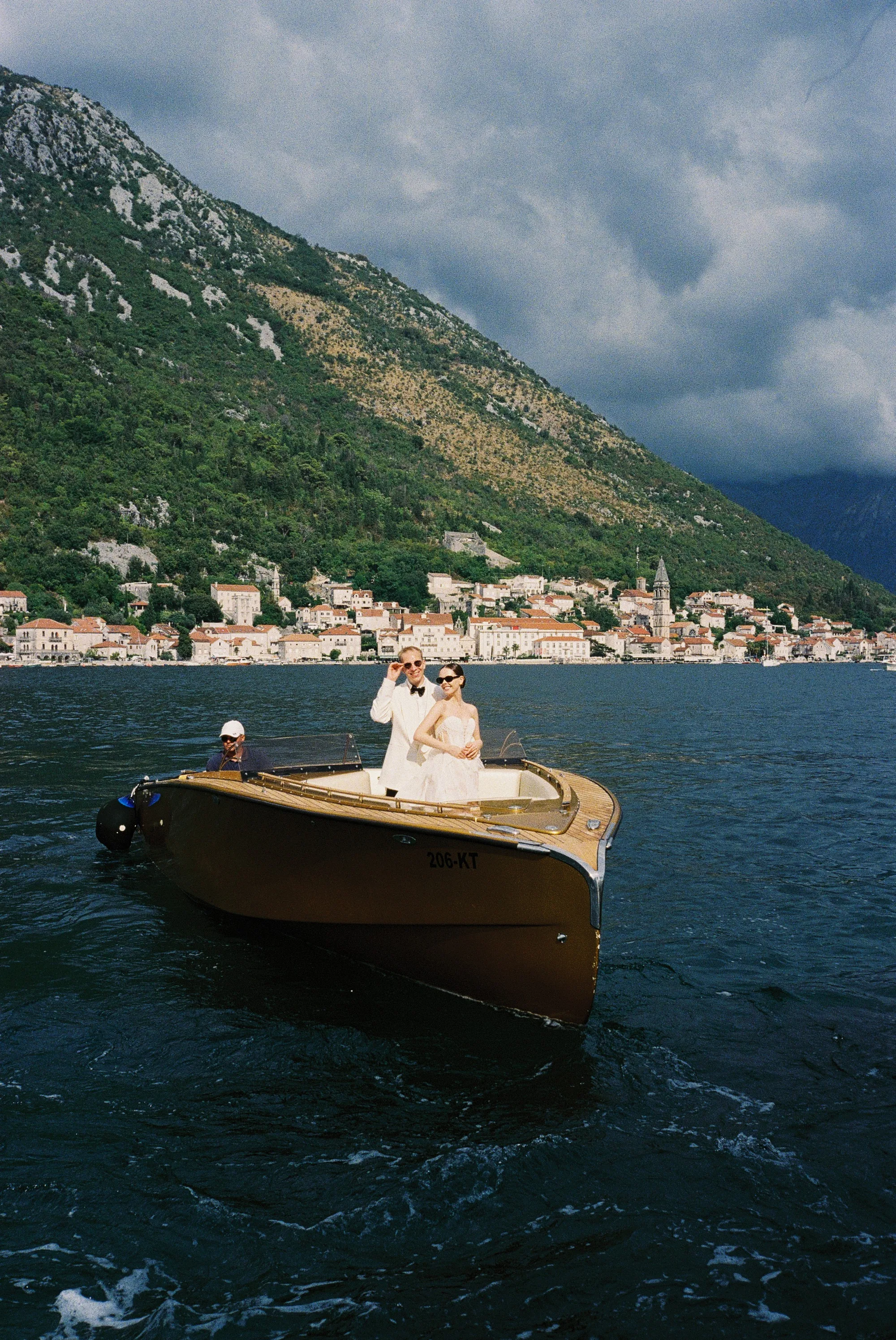 Montenegro Wedding 2 - A Romantic & Intimate Montenegro Wedding at Villa Shah, Inspired by 'La Vita Nobile' Bride and groom on a speedboat in Montenegro.