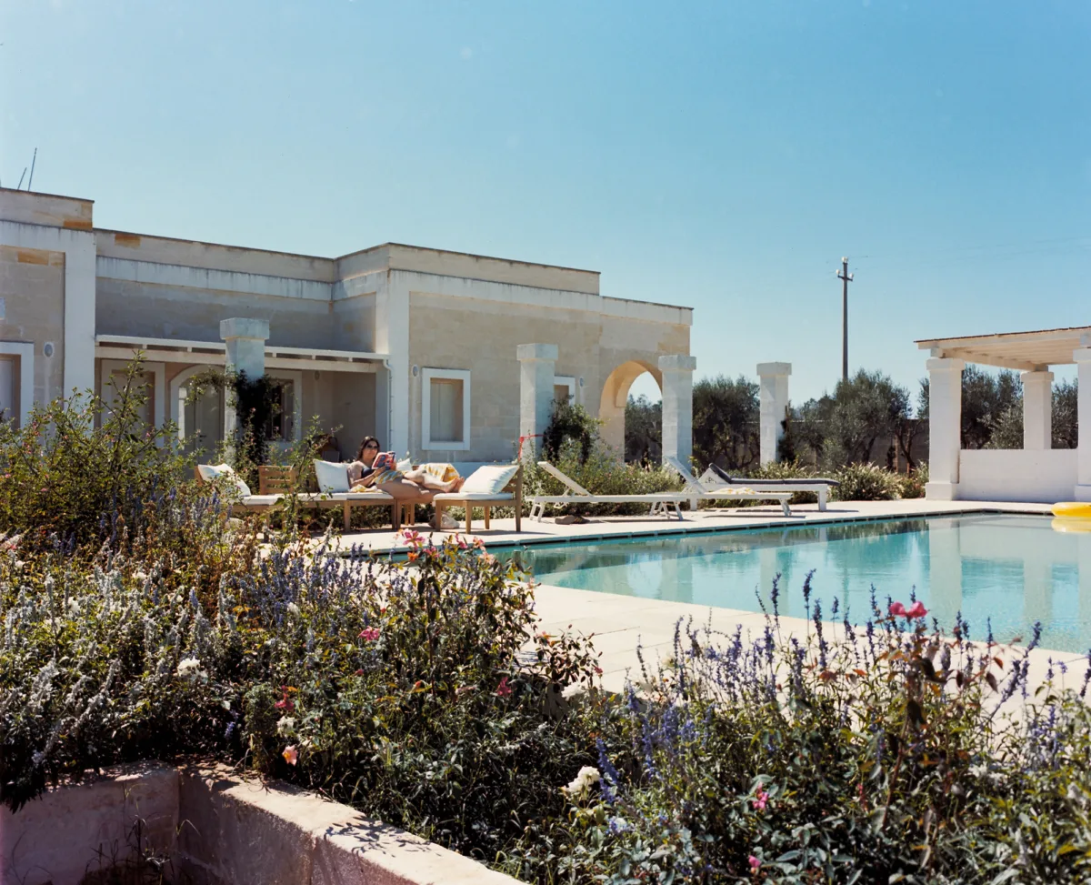 Multiple Day Destination Wedding in Masseria Potenti Puglia Italy 03 - Yael Wore Chana Marelus & A Handmade Beaded Veil for her Relaxed Italian Masseria Wedding The pool at Masseria Potenti, wedding venue in Puglia Italy.