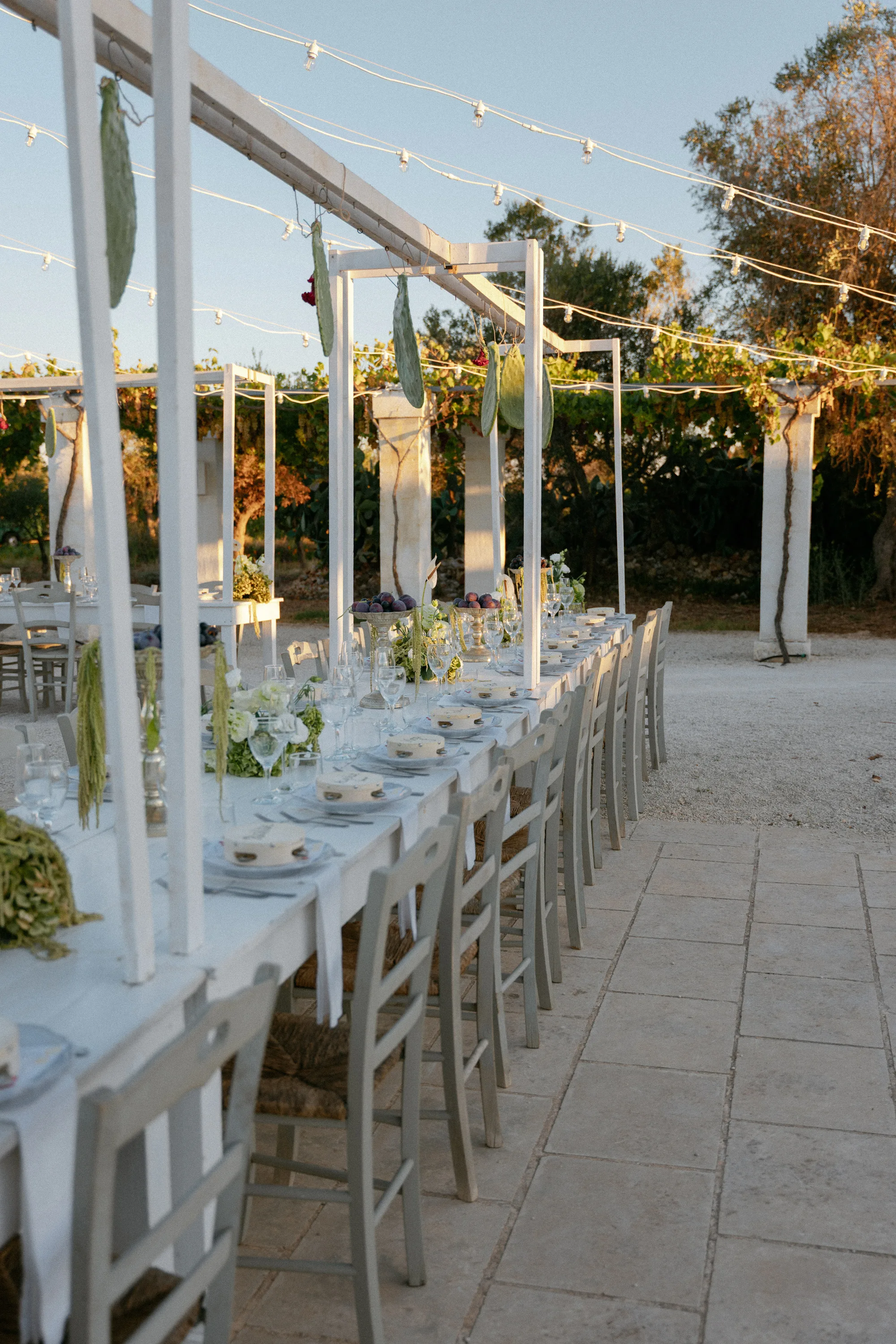 Multiple Day Destination Wedding in Masseria Potenti Puglia Italy 112 - Yael Wore Chana Marelus & A Handmade Beaded Veil for her Relaxed Italian Masseria Wedding Wedding reception at Masseria Potenti wedding venue in Puglia Italy. Long white painted tables