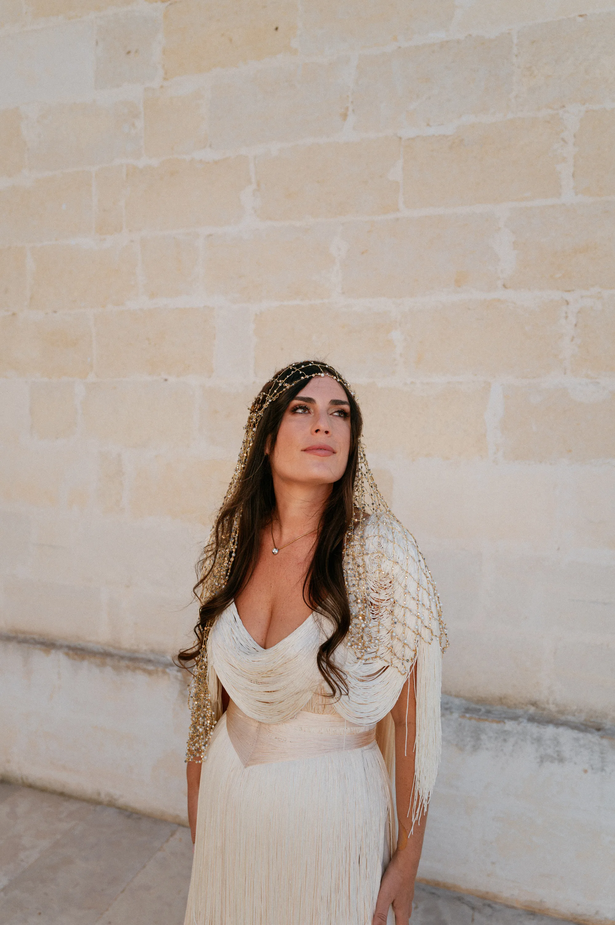 Multiple Day Destination Wedding in Masseria Potenti Puglia Italy 17 - Yael Wore Chana Marelus & A Handmade Beaded Veil for her Relaxed Italian Masseria Wedding Bride wearing a Chana Marelus with tassels and a beaded veil.