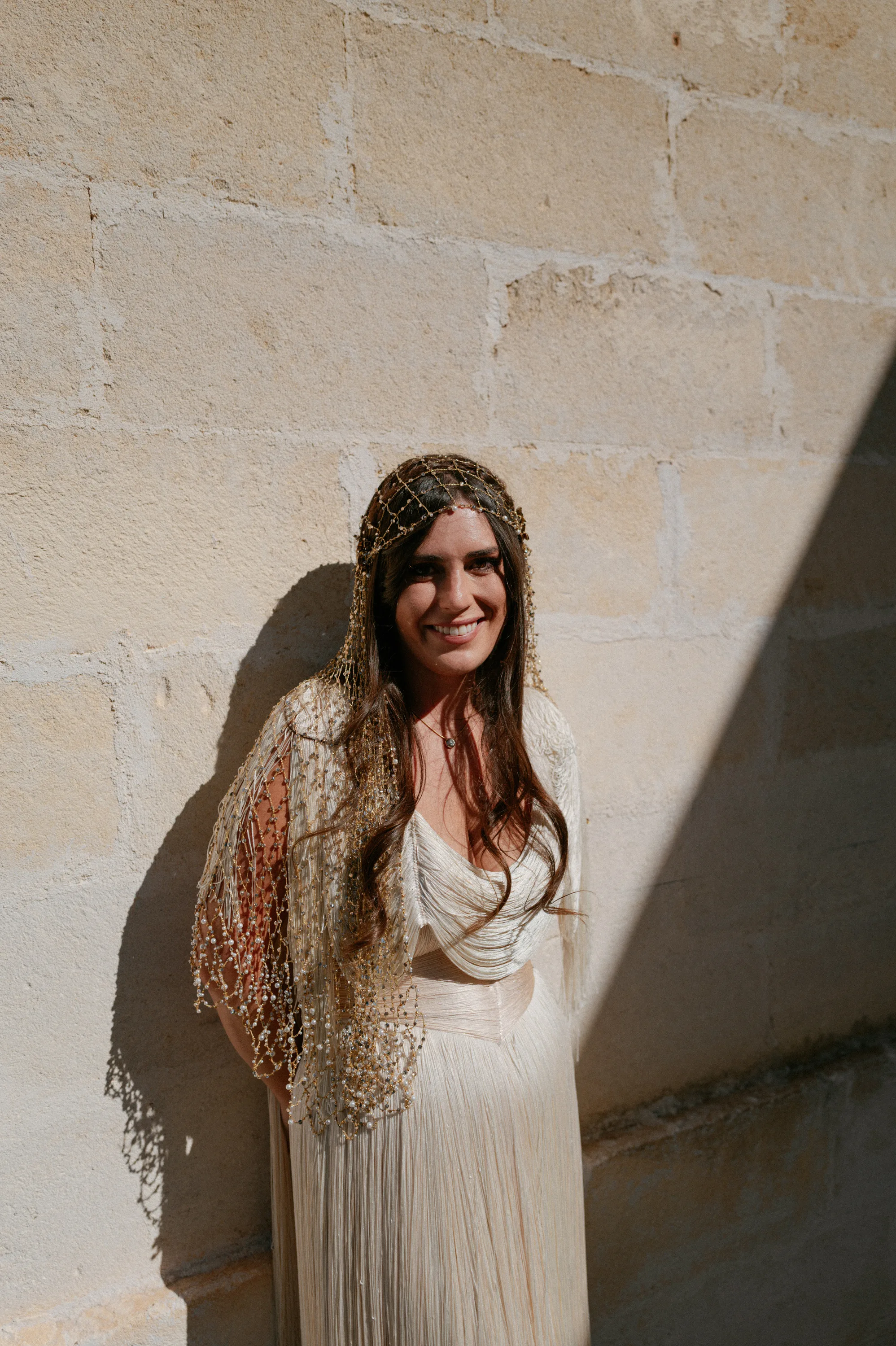 Multiple Day Destination Wedding in Masseria Potenti Puglia Italy 24 - Yael Wore Chana Marelus & A Handmade Beaded Veil for her Relaxed Italian Masseria Wedding Bride wearing a Chana Marelus with tassels and a beaded veil.