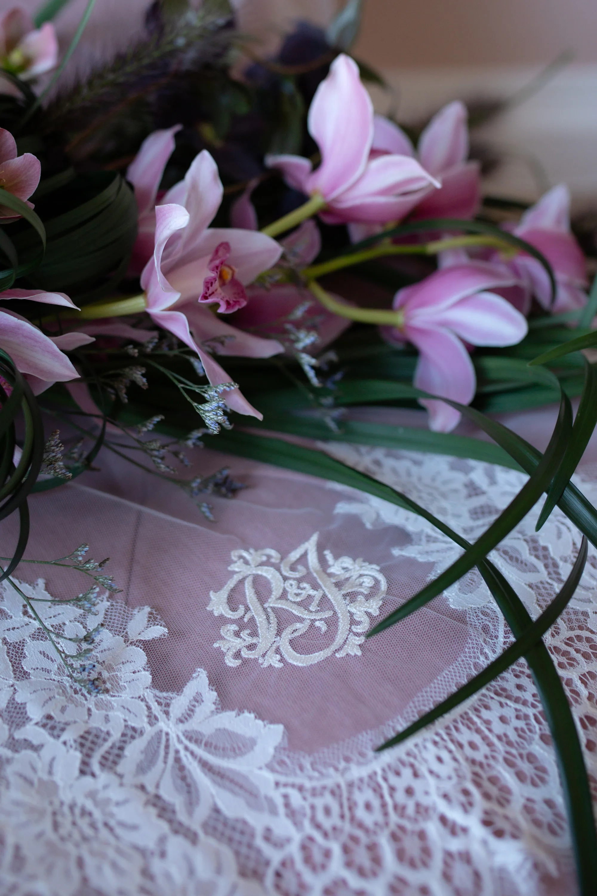 Rebecca Anne Designs embroidered wedding veils 1 - Introducing the New Embroidered Wedding Veil & Bridal Accessories Collection by Rebecca Anne Designs Close up of an embroidered veil with monogrammed lettering by Rebecca Anne Designs.