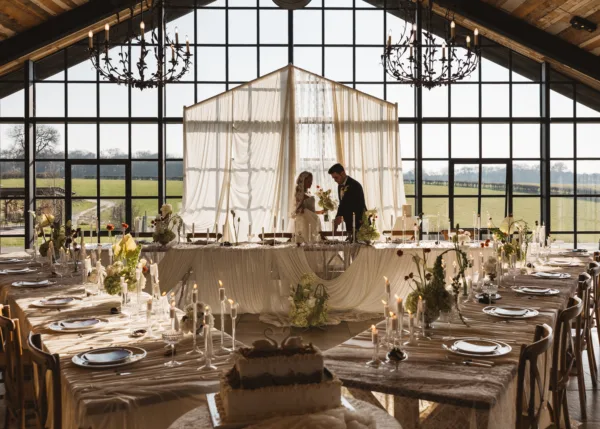 Romantic Wedding Editorial With a Triangle Seating Arrangement & Embroidered Lace Details