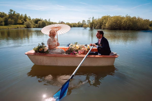 |Wedding couple rowing a boat with Everlong Ceremonies