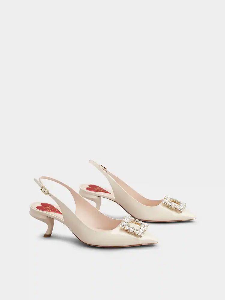 Virgule Slingback Pumps in patent leather