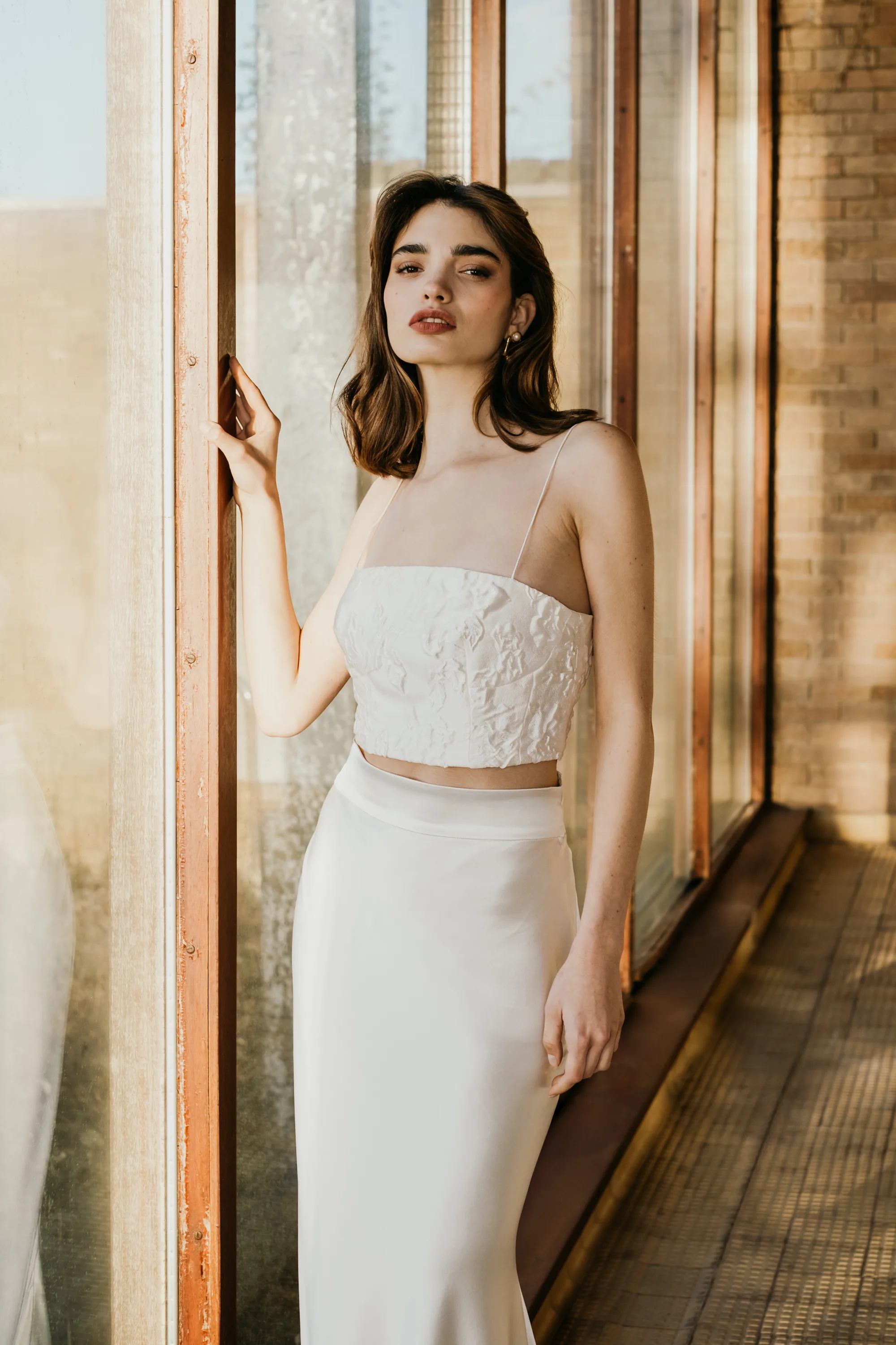 UNBRIDLED STUDIO COLLECTION IV LOOK 15 2 - UNBRIDLED STUDIO: The Label Redefining Modern Bridal Fashion And A Designer You Need To Know Gia and Sophia textured bodice and bias cut skirt by UNBRIDLED STUDIO.