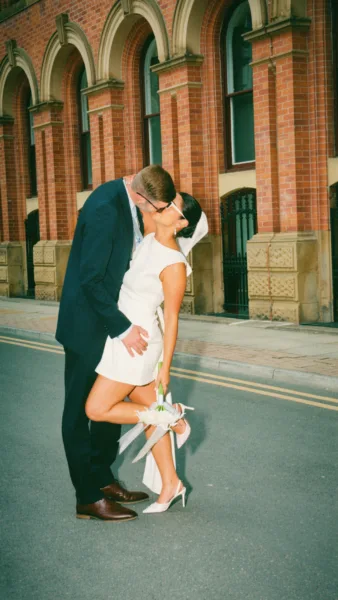 Luxury UK wedding couple walking through countryside venue at golden hour, natural candid wedding content by DuoVision