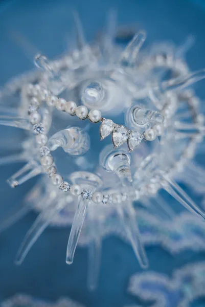 Close-up of a sparkling crystal beaded bridal headpiece, a wedding accessory detail