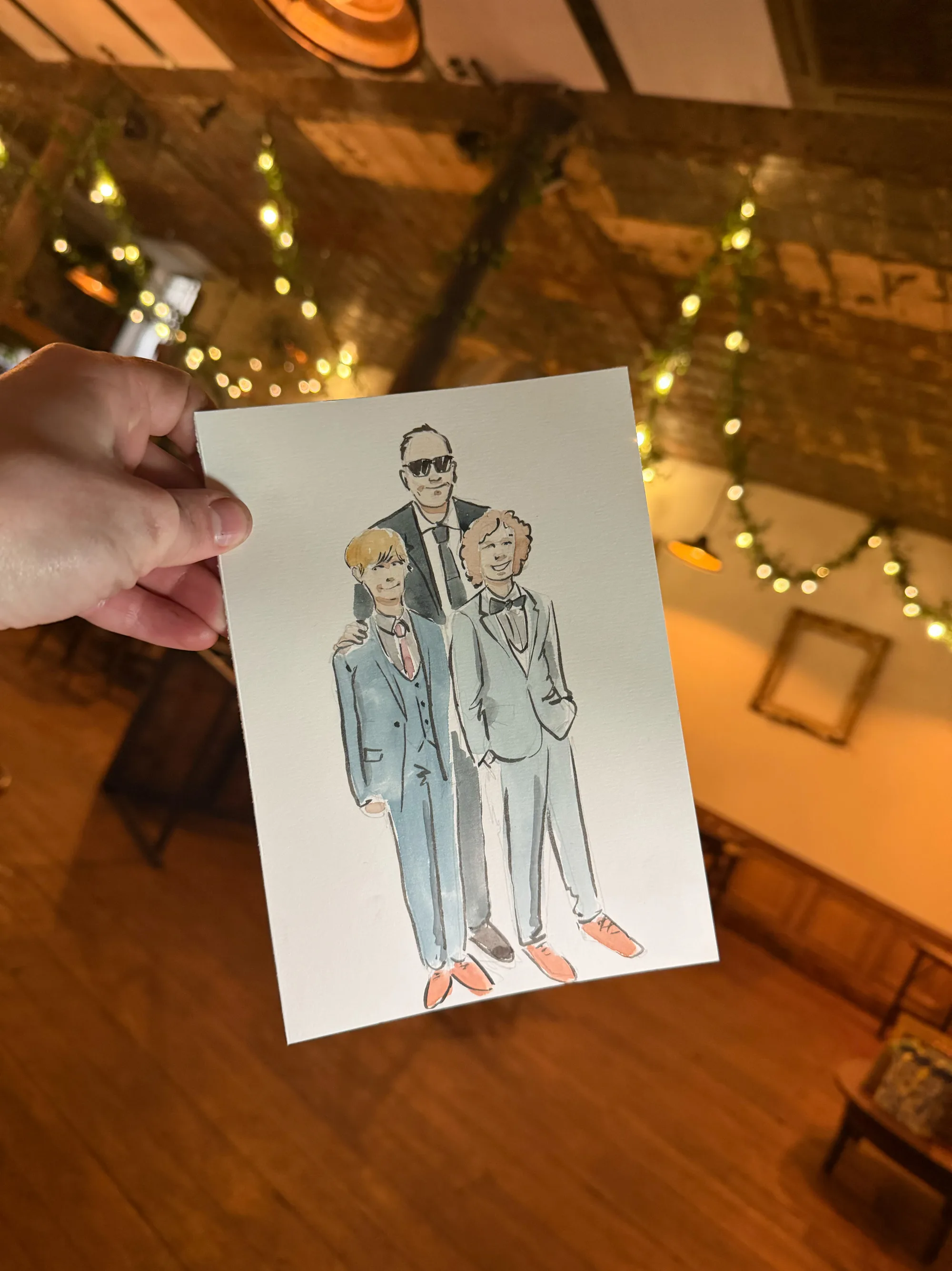 Peter Kuznicki of Kuznicki live, a live wedding artist and illustrator creating live watercolour paintings of wedding guests
