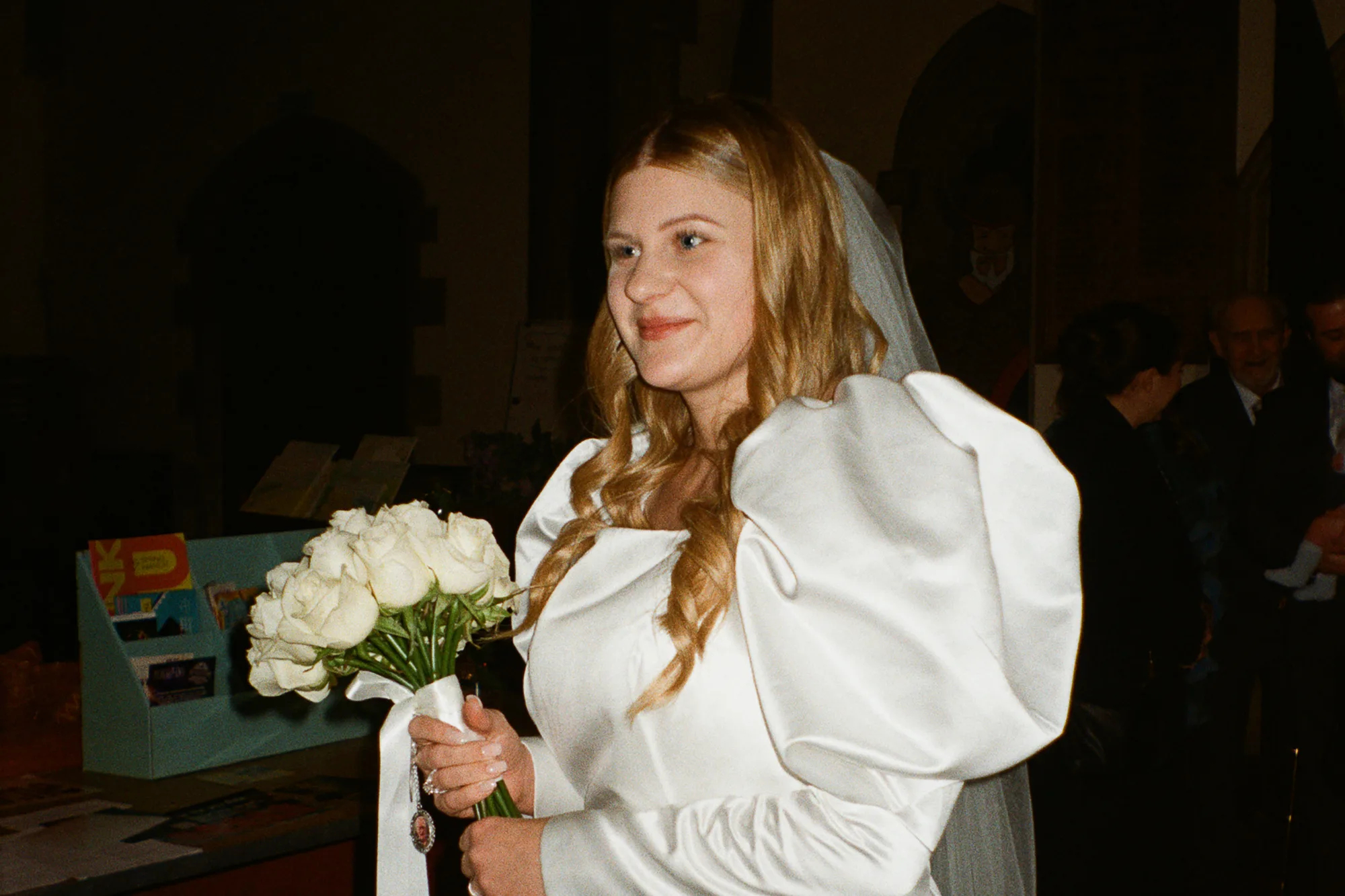 Bride in puff sleeve wedding dress