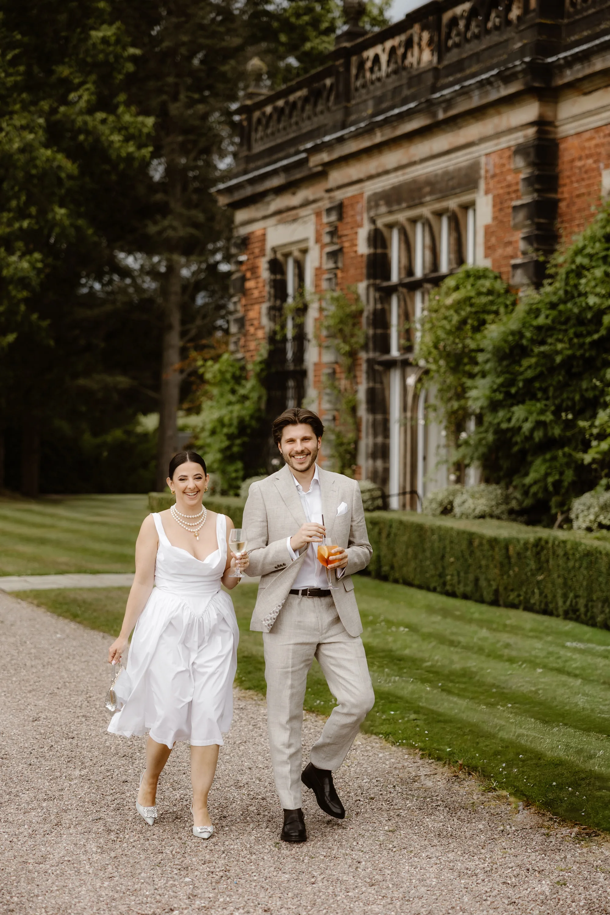 Capesthorne Hall Summer Wedding Jessica Sharpe Wedding Planner Jono Symonds Love My Dress.183 - Sophie & Dimitri's Beautiful, Relaxed & Elegant Wedding Weekend at Capesthorne Hall in Cheshire Bride wearing Vivienne Westwood and large pearls for her rehearsal dinner at Capesthorne Hall in Cheshire.