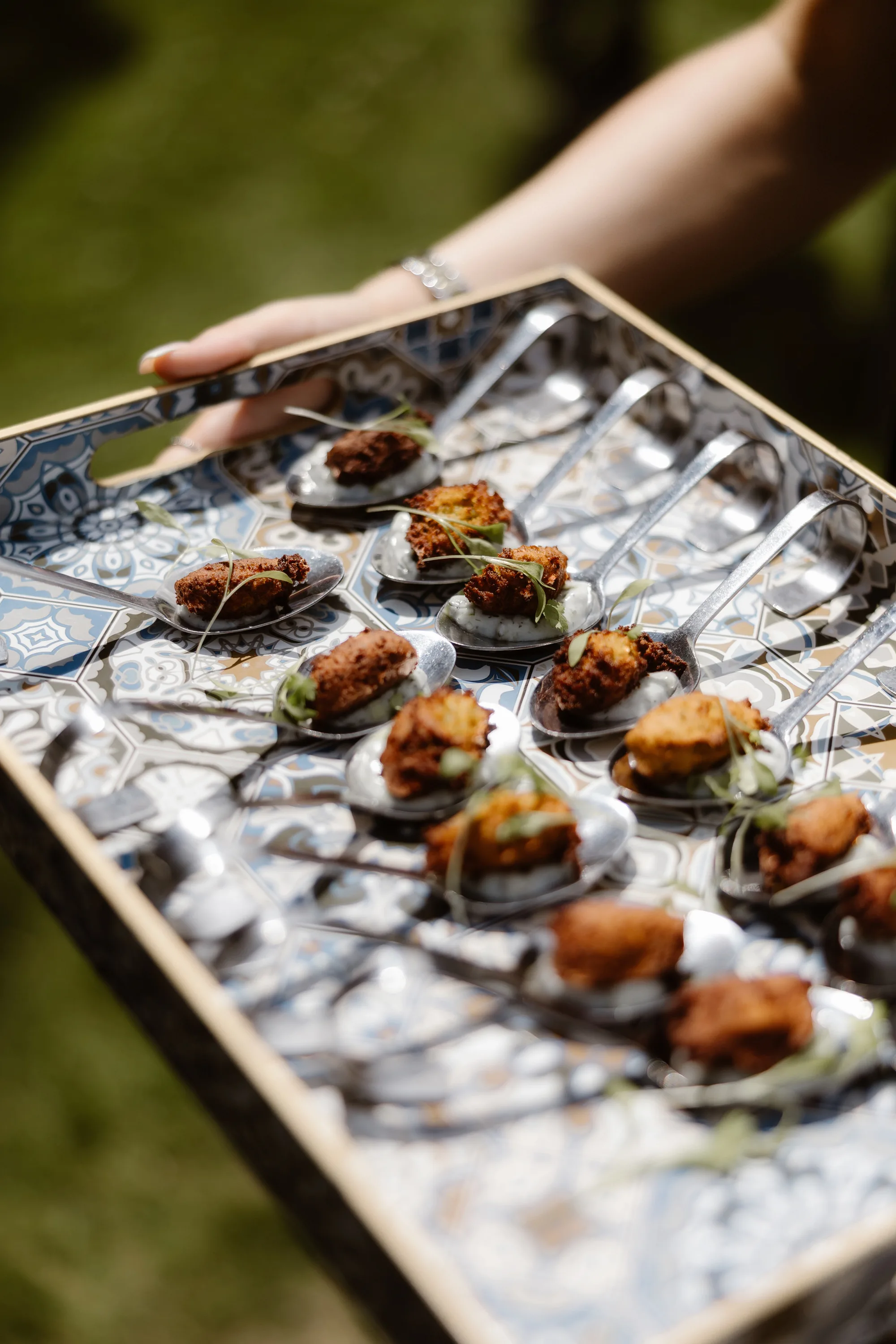 Capesthorne Hall Summer Wedding Jessica Sharpe Wedding Planner Jono Symonds Love My Dress.50 - Sophie & Dimitri's Beautiful, Relaxed & Elegant Wedding Weekend at Capesthorne Hall in Cheshire Close up of a server holding a tray of canapé.
