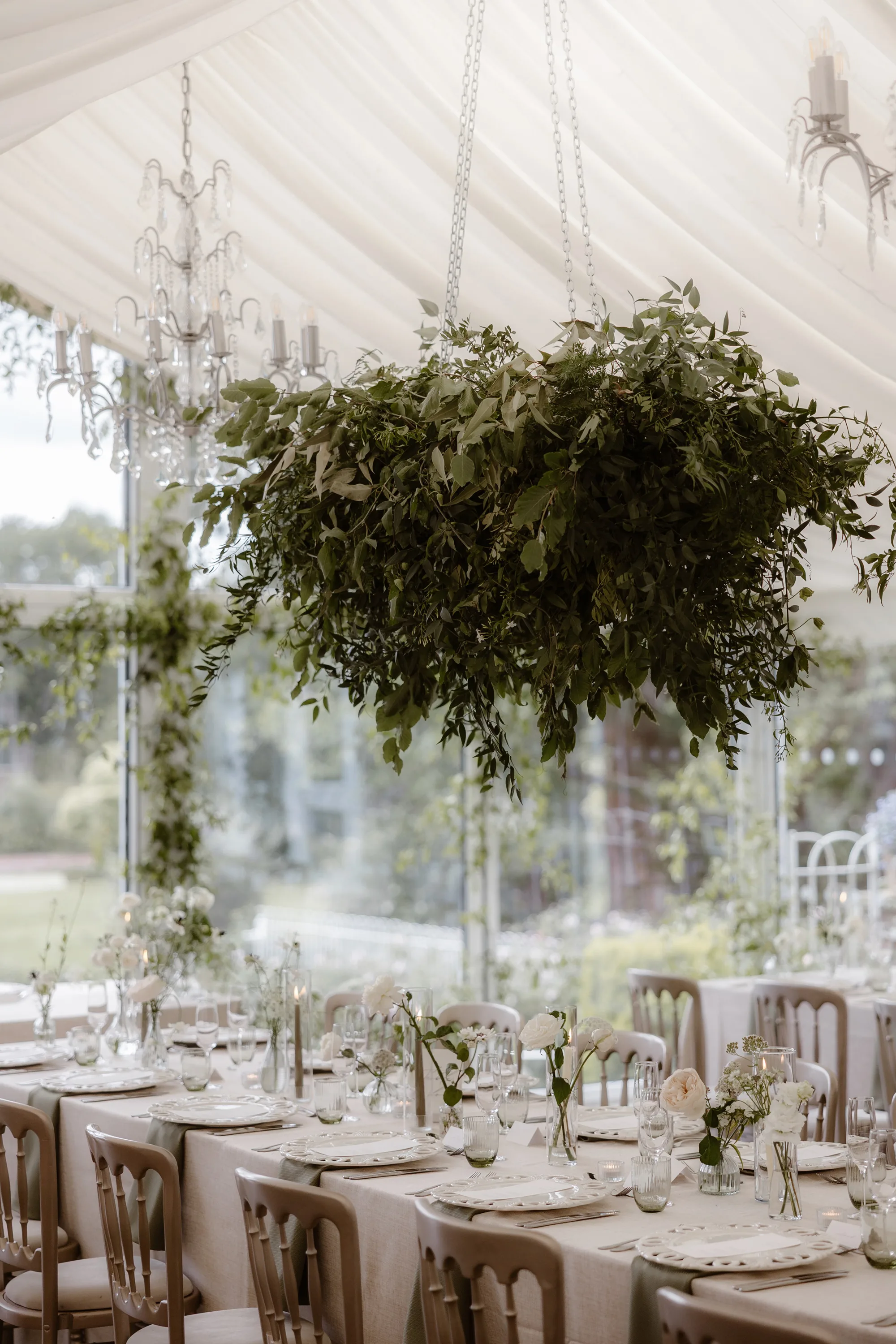 Capesthorne Hall Summer Wedding Jessica Sharpe Wedding Planner Jono Symonds Love My Dress.56 - Sophie & Dimitri's Beautiful, Relaxed & Elegant Wedding Weekend at Capesthorne Hall in Cheshire Foliage installation of green hanging above the tables at Capesthorne Hall wedding venue